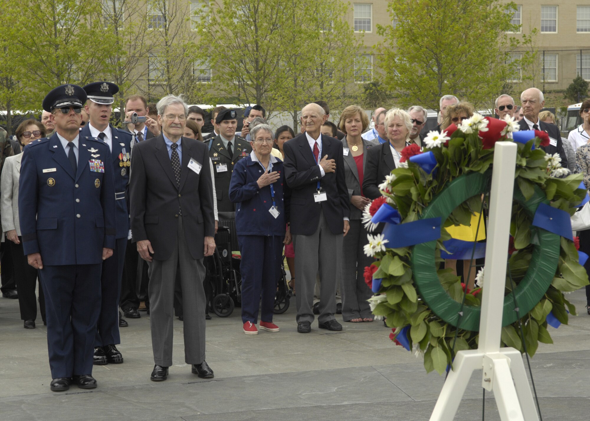 Maj. Gen. Robert L. Smolen, Air Force District of Washington commander, hosts the Air Force Wreath Laying Ceremony in honor of the Flak Man crew at the Air Force Memorial, Arlington, Va., April 24. The wreath was placed by Edward McNally, the Bombardier of the B-24 Bomber, The Flak Man, in honor of the former crew members of the Flak Man who dedicated their lives to the cause of freedom. (U.S. Air Force photo by Senior Airman Rusti Caraker)  