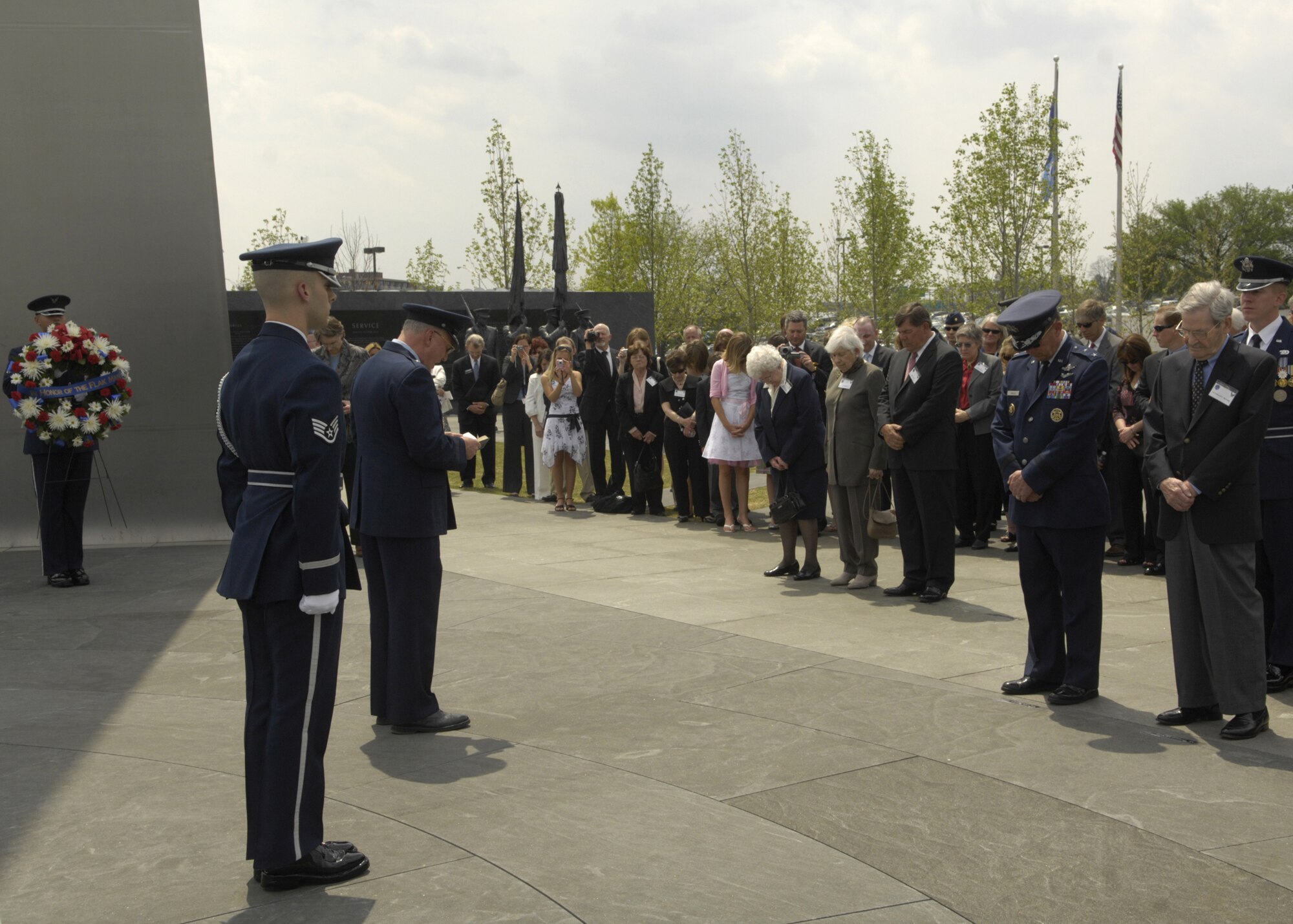 Chaplain (Brig. Gen.) Cecil R. Richardson gives the invocation during a wreath-laying ceremony in honor of the Flak Man crew at the Air Force Memorial, Arlington, Va., April 24. The wreath was placed by Edward McNally, the Bombardier of the B-24 Bomber, The Flak Man, in honor of the former crew members of the Flak Man who dedicated their lives to the cause of freedom. (U.S. Air Force photo by Senior Airman Rusti Caraker)