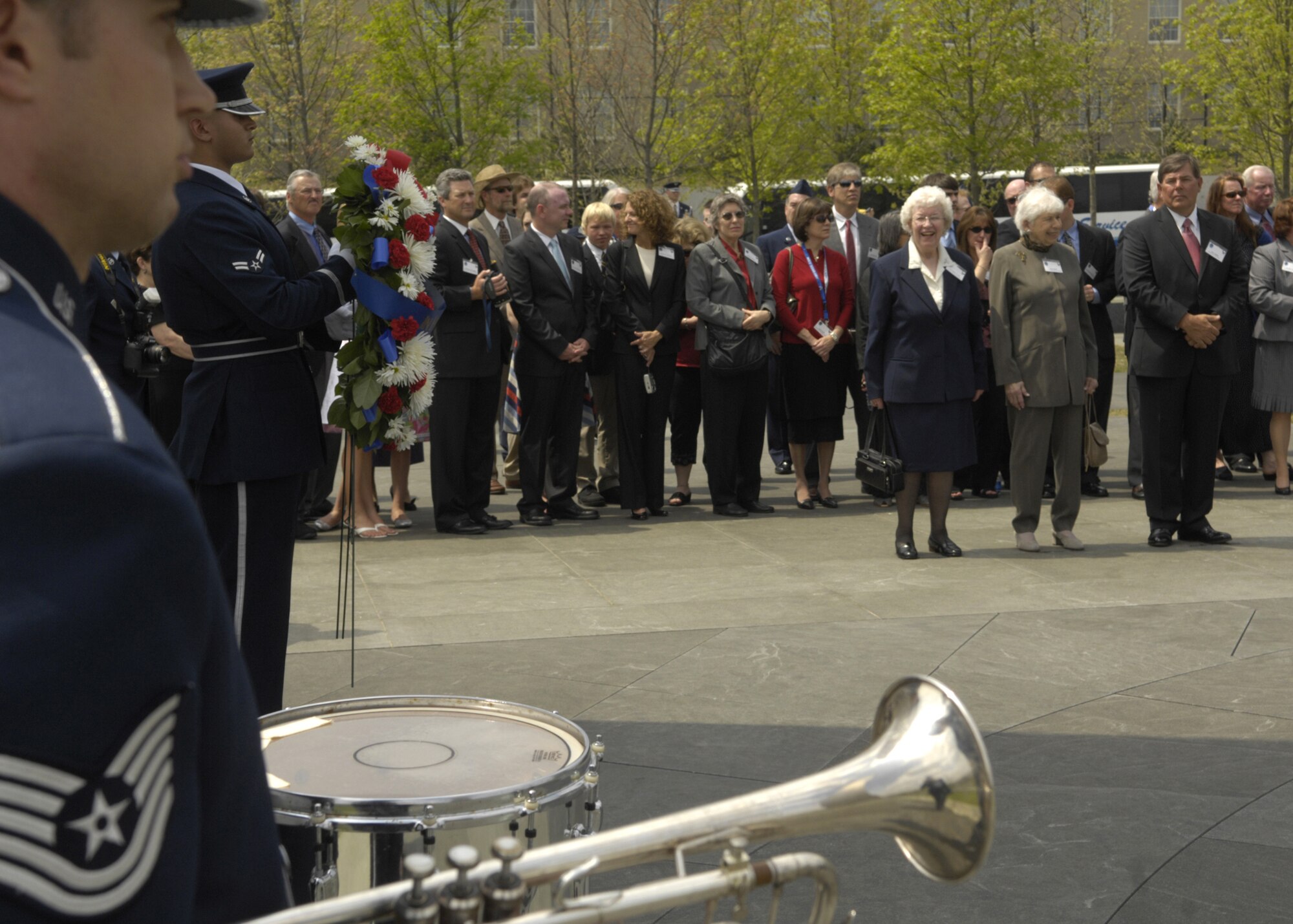 Family and friends gather in memory of the Flak Man crew, after a wreath-laying ceremony at the Air Force Memorial, Arlington, Va., April 24. The wreath was placed by Edward McNally, the Bombardier of the B-24 Bomber, The Flak Man, in honor of the former crew members of the Flak Man who dedicated their lives to the cause of freedom. (U.S. Air Force photo by Senior Airman Rusti Caraker)