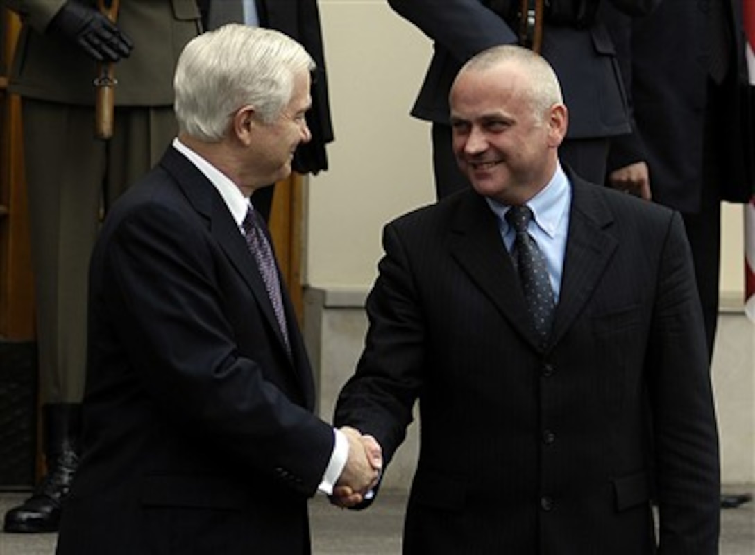 Secretary of Defense Robert M. Gates (left) shakes hands with Polish Minister of Defense Aleksander Szczyglo in Warsaw, Poland, on April 24, 2007.  Gates is in Poland to discuss missile defense and the country's military participation in Iraq and Afghanistan.  