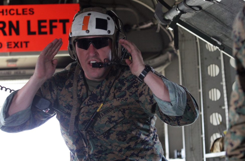 Sgt. James J. Creel, an infantryman currently assigned as the Anti-Terrorism Force Protection and ground training chief for Marine Aircraft Group 29 teaches a class for the Marine All-Weather Fighter Attack Squadron 121 quick reaction force, April 26.