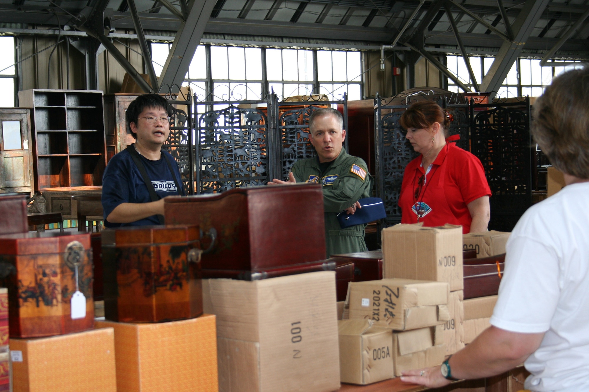 Brig. Gen. Joseph Reheiser, 5th Air Forcevice commander, visits with volunteers and vendors during last year's bazaar sponsored by the Yokota Officers' Spouses' Club (Courtesy photo)