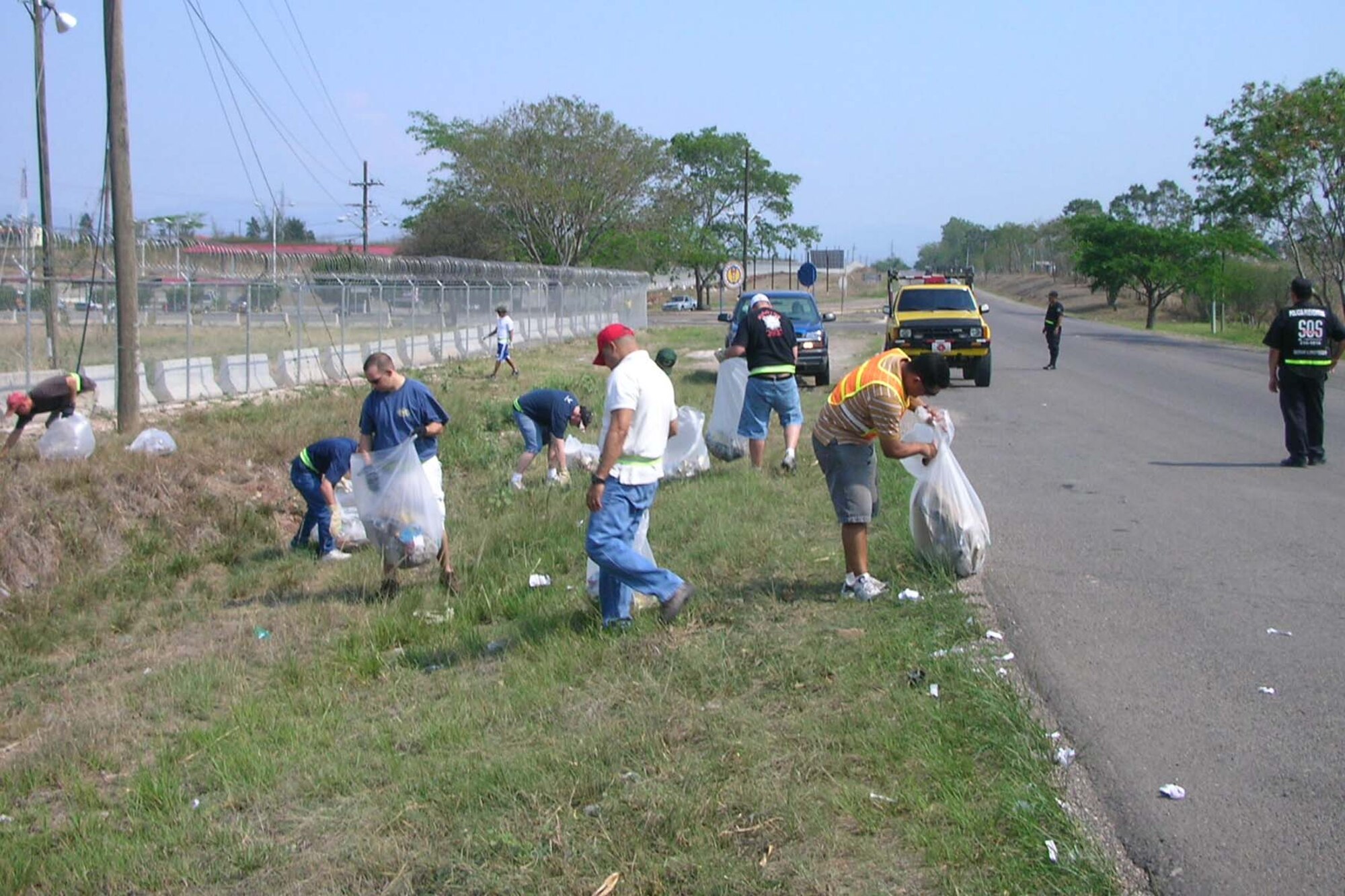 SOTO CANO AIR BASE, REPUBLIC OF HONDURAS -- Approximately 20 U.S. military from Joint Task Force-Bravo spent three hours picking up trash on a one-mile stretch of CA-5, Honduras’ single major highway that runs in front of Soto Cano Air Base. (U.S. Air Force photo by Staff Sgt. Chyenne A. Griffin) 