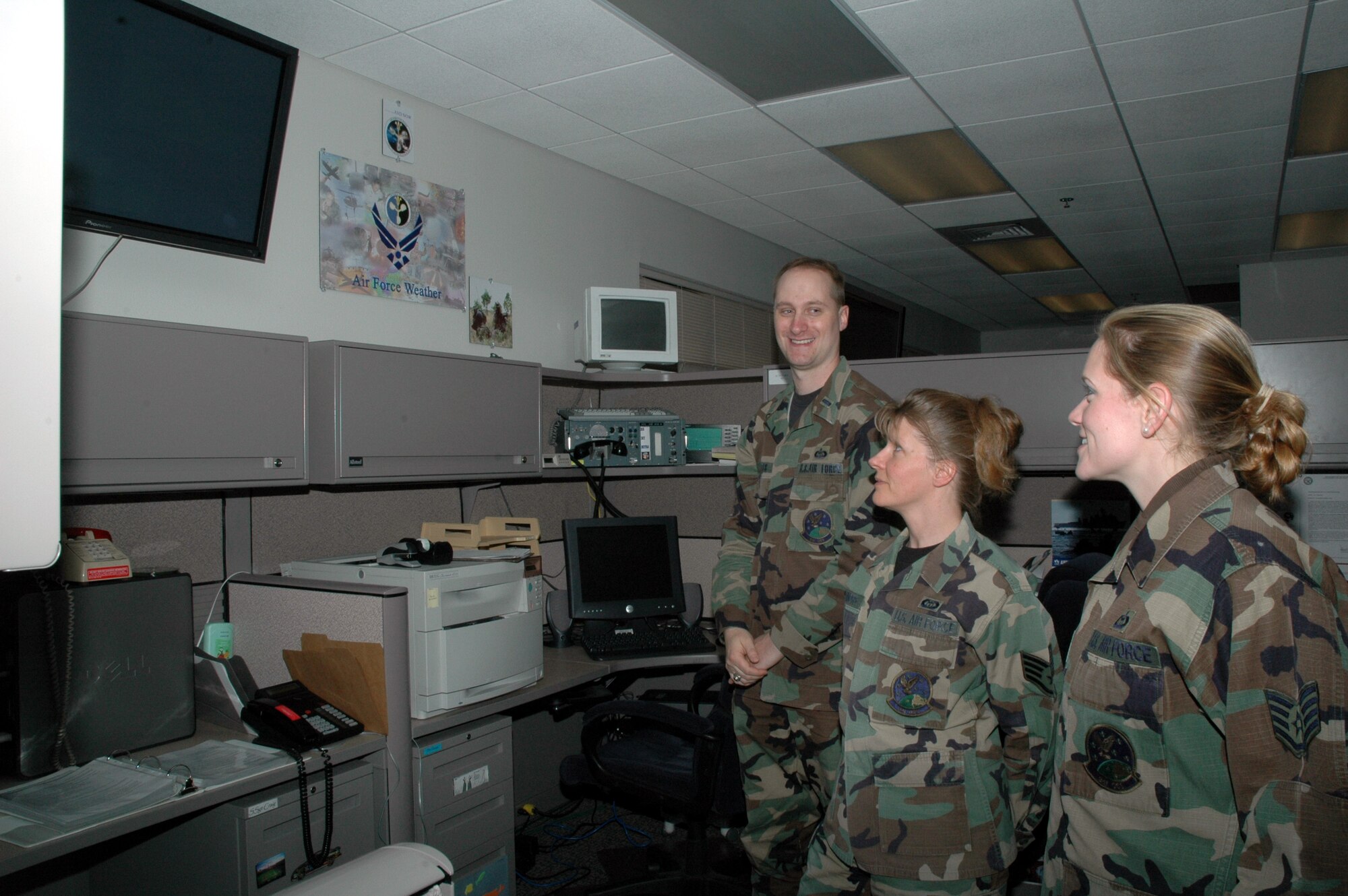 First Lieutenant Brian Yates, 341st Operations Support Squadron Weather Flight commander, briefs his troops on weather conditions.
