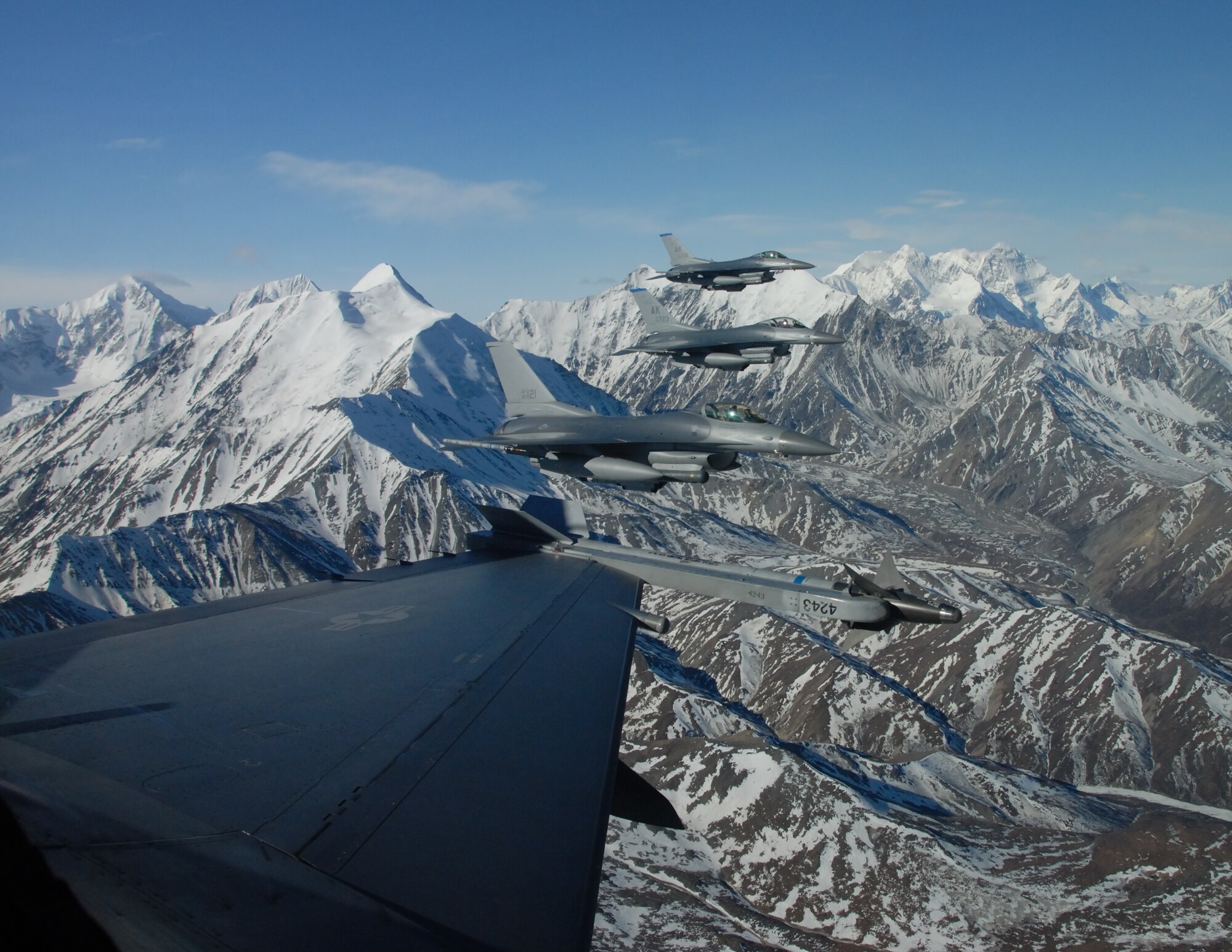 EIELSON AIR FORCE BASE, Alaska--F-16 Fighting Falcon's from the18th Fighter Squadron fly formation over the Pacific Alaska Range Complex.  The 18th Fighter Squadron conducts air operations for combat-ready F-16 aircraft, working closely with 355th Fighter Squadron to provide close air support, forward air control (airborne), battlefield air interdiction, and offensive counter air. (U.S. Air Force photo by Master Sgt. Robert Wieland) 