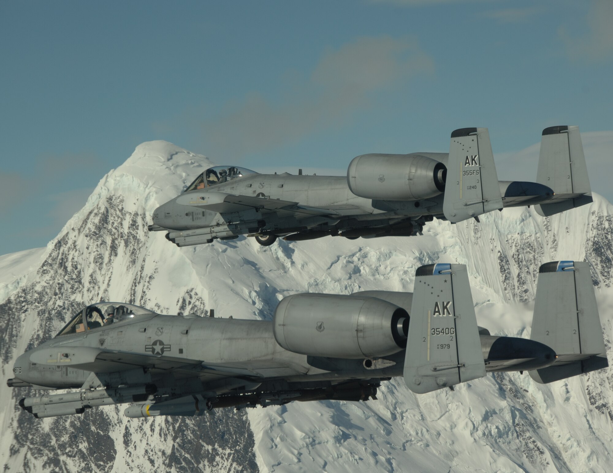 EIELSON AIR FORCE BASE, Alaska-- A/OA-10 Warthog's from the 355th Fighter Squadron fly over the Pacific Alaska Range Complex during live fire training.The 355th Fighter Squadron is tasked to provide mission ready A/OA-10s as well as search and rescue capability, in Alaska and deployed sites worldwide. (U.S. Air Force photo by Master Sgt. Robert Wieland) 