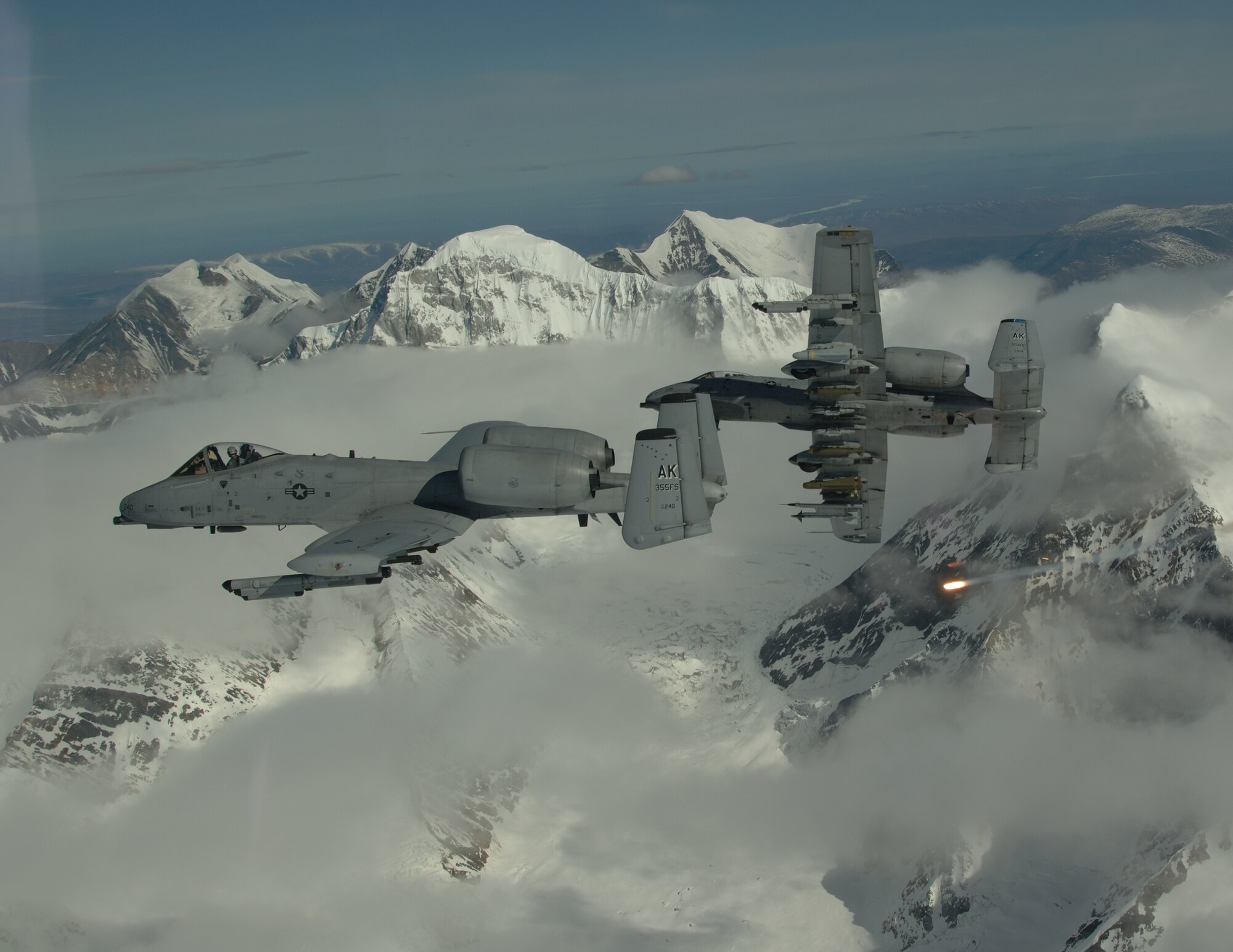 EIELSON AIR FORCE BASE, Alaska-- A/OA-10 Warthog's from the 355th Fighter Squadron break over the Pacific Alaska Range Complex during live fire training.The 355th Fighter Squadron is tasked to provide mission ready A/OA-10s, as well as search and rescue capability in Alaska and deployed sites worldwide. (U.S. Air Force photo by Master Sgt. Robert Wieland) 