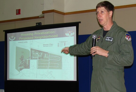 Col. Richard Klumpp Jr., 71st Flying Training Wing commander, explains the housing privatization project to town hall meeting attendees at the youth center Monday. (U.S. Air Force photo / Tech. Sgt. Mary Davis)                               