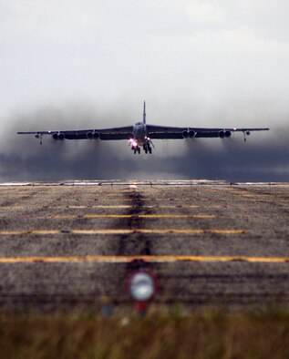 A B-52 Stratofortress takes off at Homestead Air Reserve Base, Fla., April 26.  The heavy bomber, assigned to Air Force Reserve Command’s 93rd Bomb Squadron, Barksdale Air Force  Base, La., stopped at Homestead for 3 days while performing aerial intercept training with local South Florida units.  The bomber’s capacity to linger for long times over battlefields before delivering precision direct fire munitions has been a valuable asset in conflicts such as Operation Enduring Freedom, where the enemy has limited air-defense capabilities.  Homestead was home to the heavy bombers during the 1960s when the base operated the 19th Bomb Wing, a component of Strategic Air Command.  This was the first time Homestead ARB hosted a B-52 in at least the past five years according to airfield management officials here.  The Air Force intends to keep the B-52 in service until at least 2040, an unprecedented length of service for a military aircraft. (U.S. Air Force photo/Ryan Ayers)