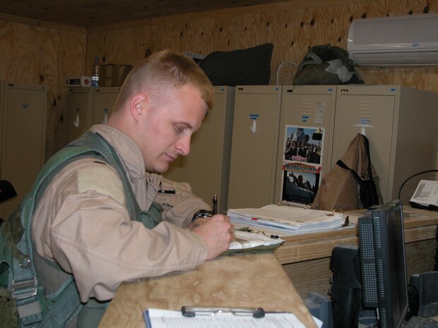 AL ASAD AIR BASE, Iraq — 1st Lt. Chris "Harpoon" Laird prepares for a combat mission over Al Anbar Province in western Iraq. The lieutenant is an A-10 Thunderbolt II pilot with the 74th Fighter Squadron, 438th Air Expeditionary Group, which is assigned to the 332nd Air Expeditionary Wing, the only Air Force wing in Iraq. The group activated Jan. 15, 2007, to provide close air support for Coalition Forces in the region. Within hours of standing up as a fully operational combat flying unit, the group was launching its fierce 'Warthogs' into battle. The A-10's distinctive nose art has been known to strike fear into enemy combatants unlucky enough to see its hungry, shark-toothed facade grinning at them. The Wichita, Kan. native has flown about 30 combat missions in Iraq. (U.S. Air Force photo/Master Sgt. Bryan Ripple)