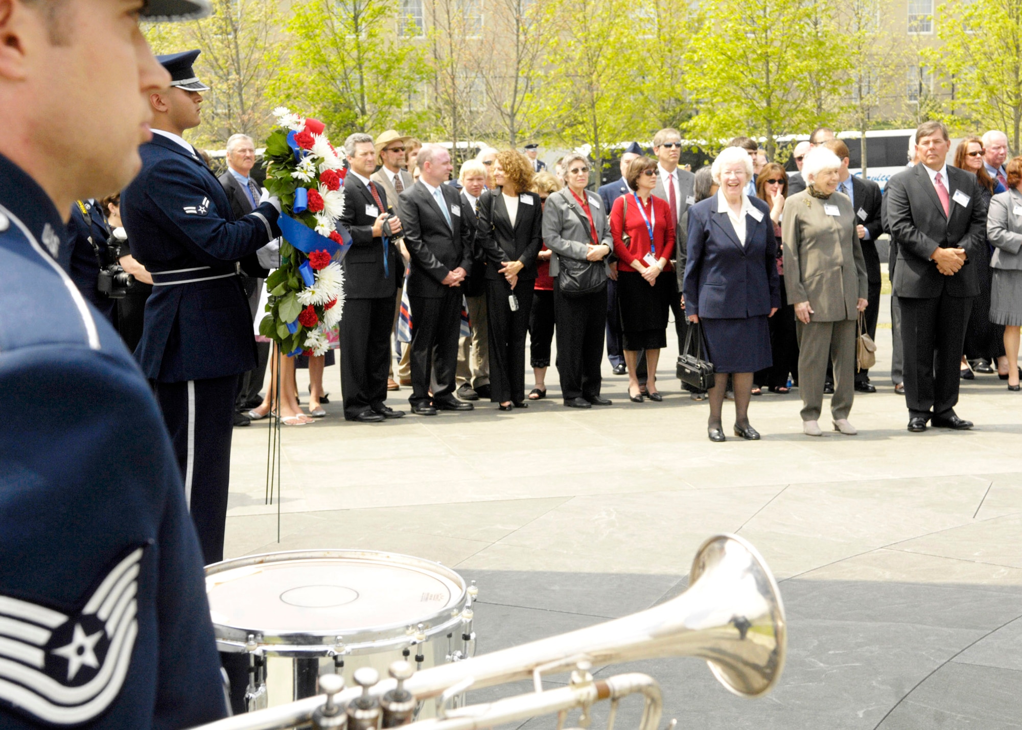 World War II's "Flak Man" B-24 Liberator crew members were honored with the Distinguished Flying Cross during a ceremony April 24 in Washington, D.C. Beforehand they participated in a wreath-laying ceremony at the Air Force Memorial. From left are: 1st Lt. Edward L. McNally, Staff Sgt. Robert D. Speed, Tech. Sgt. Jay T. Fish and Air Force District of Washington Commander Maj. Gen. Robert Smolen. (U.S. Air Force photo/Senior Airman Rusti Caraker)