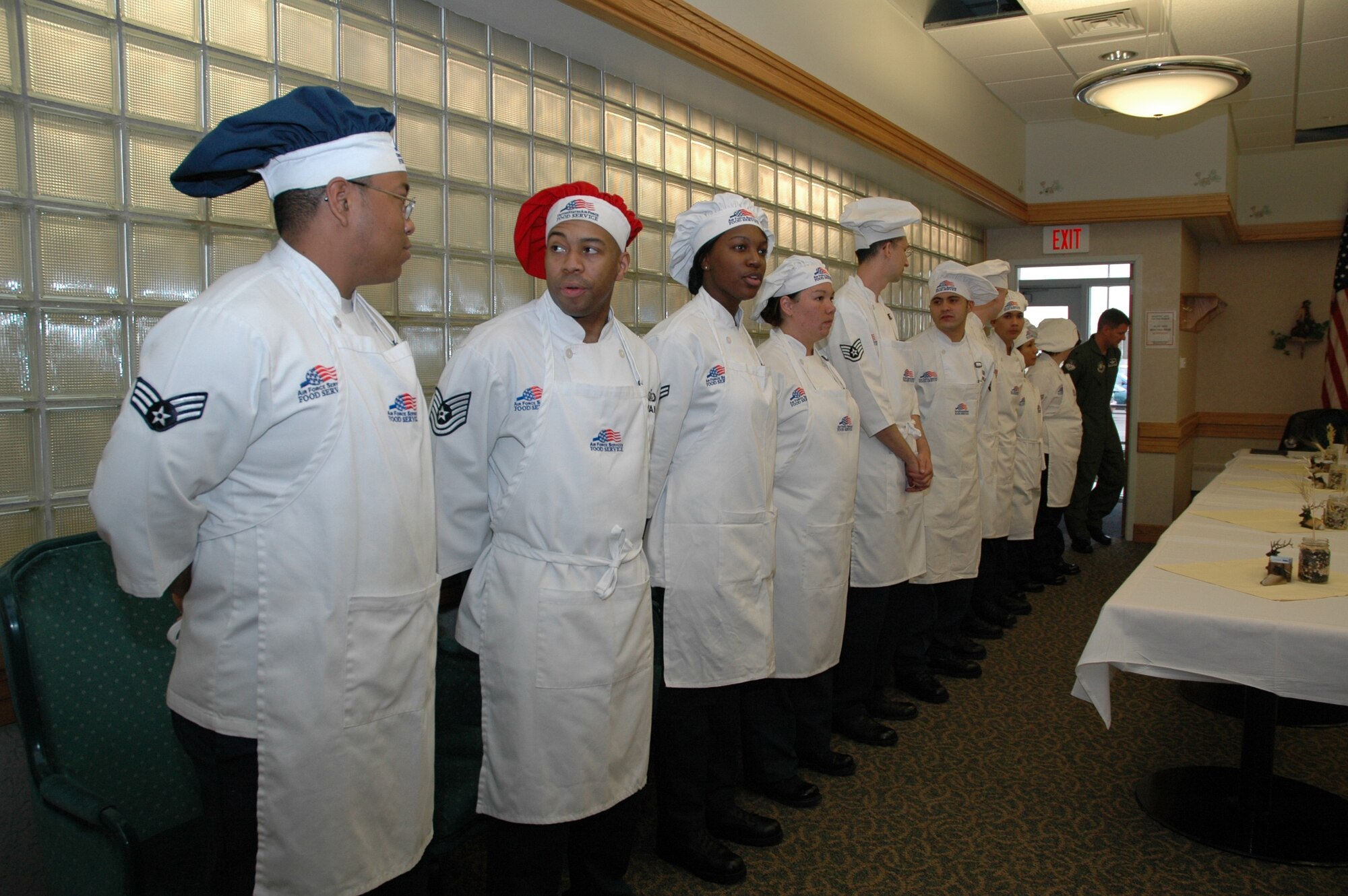 The five competitng chef teams line up at the entrance to the Elkhorn Diner prior to the start of the 1st Quarter Warrior Chef competition.
