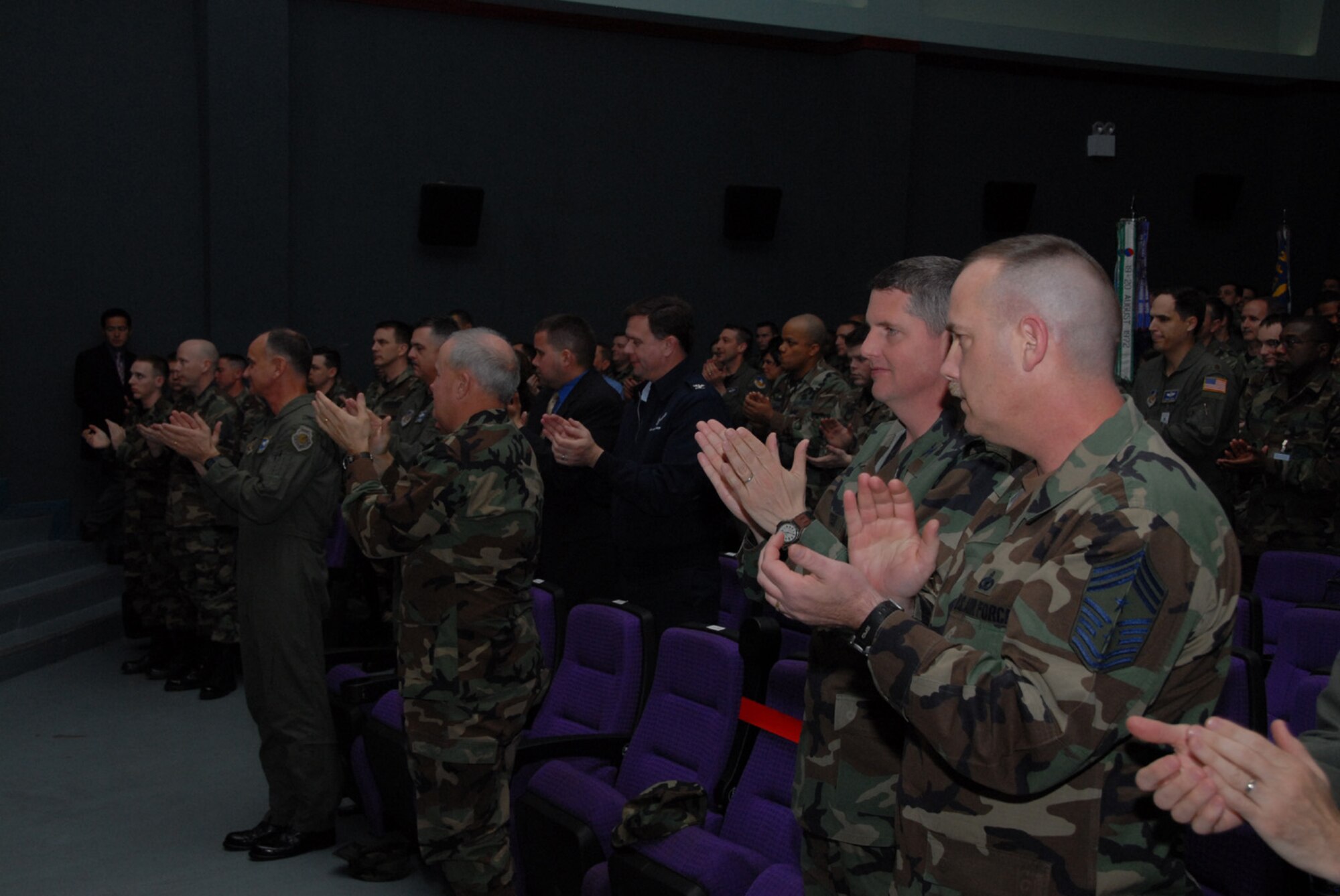 Senior leaders applaud Tuesday after the Pacific Air Forces inspector general announced Osan received an "Excellent” for its operational readiness inspection. (U.S. Air Force photo by Staff Sgt. Christopher Marasky) 