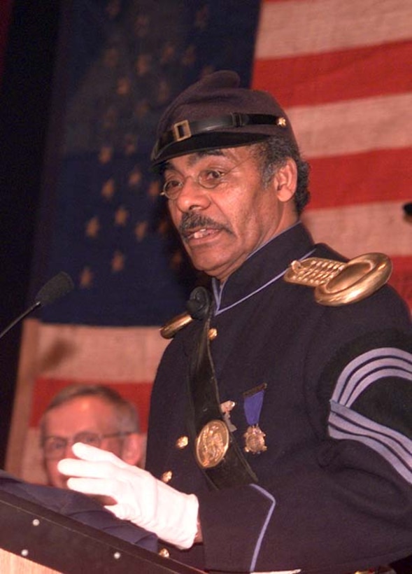 Civil War re-enactor Joseph Lee of Philadelphia says the stolen 12th Regiment Corps d'Afrique battle flag recently recovered by the FBI could help teach his children, grandchildren and all African American children about their ancestry. Lee attended a Feb. 17 ceremony in Washington in which the FBI returned the artifact to Army officials. Rudi Williams 