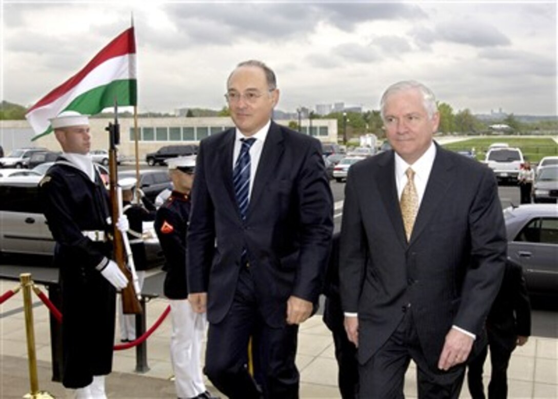 Hungarian Minister of Defense Imre Szekeres (left) arrives at the Pentagon, April 26, 2007, for security discussions with U.S. Defense Secretary Robert M. Gates (right).  