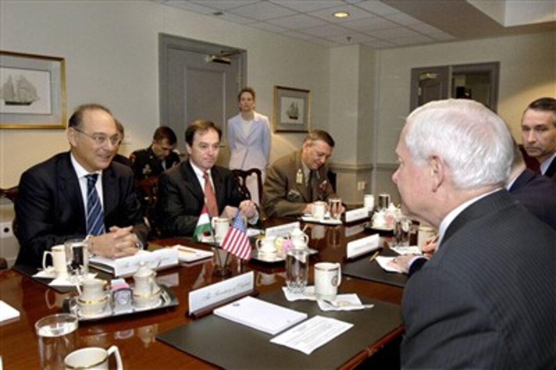 Hungarian Minister of Defense Imre Szekeres (left) meets with Secretary of Defense Robert M. Gates (right) in the Pentagon on April 26, 2007.  A broad range of bilateral security issues are under discussion.  Joining Szekeres are Ambassador Anras Simonyi (2nd from left) and the Defense Attaché at the Hungarian Embassy Col. Janos Varga (3rd from left).  