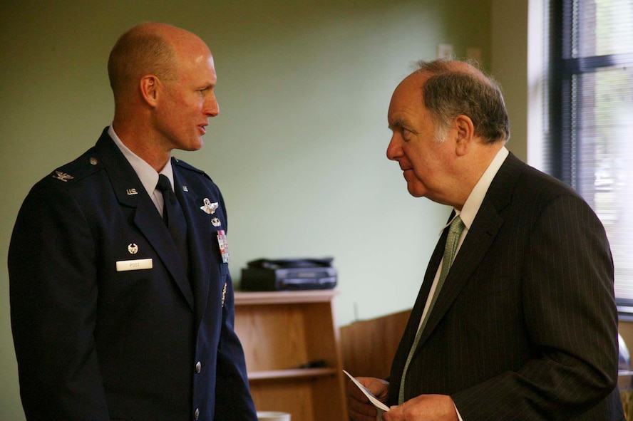 SHAW AIR FORCE BASE, S.C. -- Col. James Post, 20th Fighter Wing commander, talks to U.S. Rep. John Spratt at the dedication ceremony April 27 for the new McElveen Library. Shaw dedicated its new, state-of-the-art library in memory of W. Ashby "Mayor Bubba" McElveen Jr., well-known former mayor of Sumter. (U.S. Air Force photo/Senior Airman Holly MacDonald)