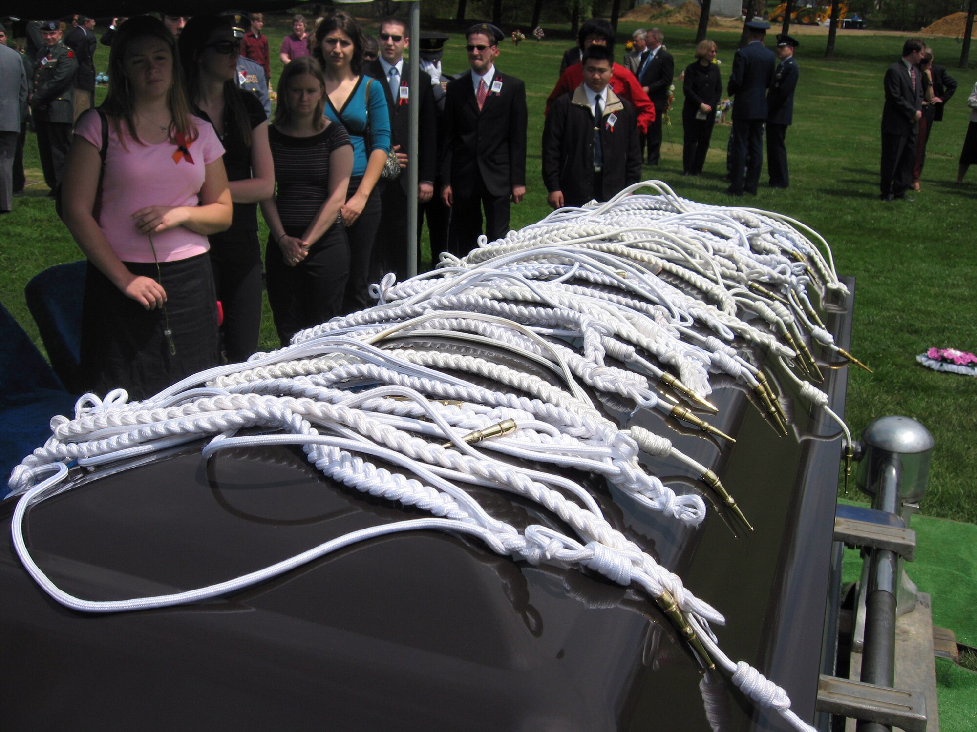 The Virginia Tech Corps of Cadets paid honors to one of their classmates in Blacksburg, Va., April 25. Cadet Matthew La Porte, a sophomore in Air Force ROTC Detachment 875 and the Virginia Tech Corps of Cadets, was one of the 32 students and faculty killed during the shooting incident at the school April 16. At the end of the service, Cadet La Porte's classmates placed their white Presidential Citation cords on their classmate's casket. (Courtesy photo) 