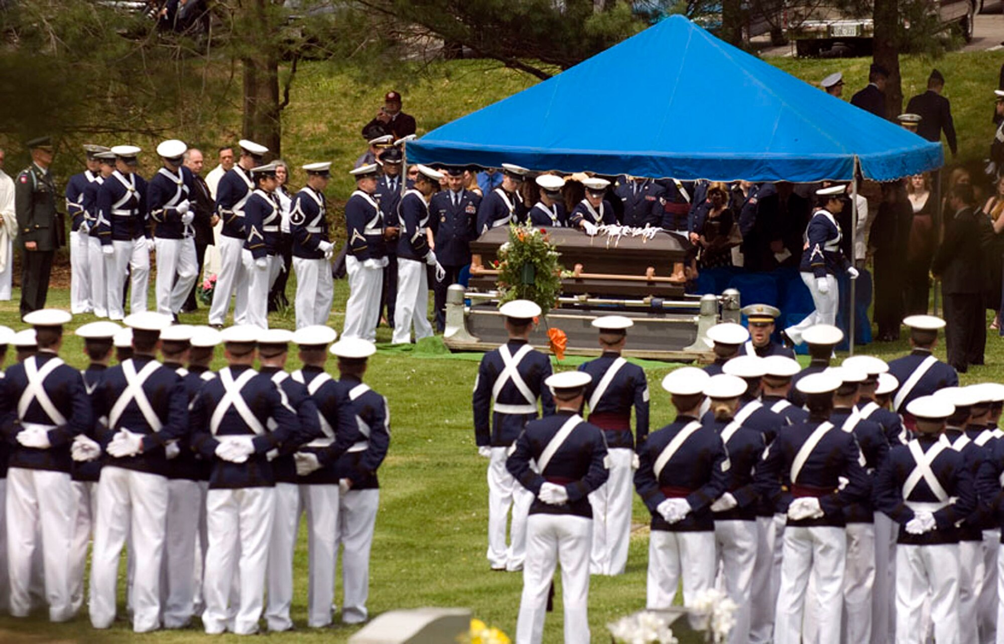 The Virginia Tech Corps of Cadets paid honors to one of their classmates in Blacksburg, Va., April 25. Cadet Matthew La Porte, a sophomore in Air Force ROTC Detachment 875 and the Virginia Tech Corps of Cadets, was one of the 32 students and faculty killed during the shooting incident at the school April 16. At the end of the service, Cadet La Porte's classmates placed their white Presidential Citation cords on their classmate's casket. (Courtesy photo/John McCormick) 