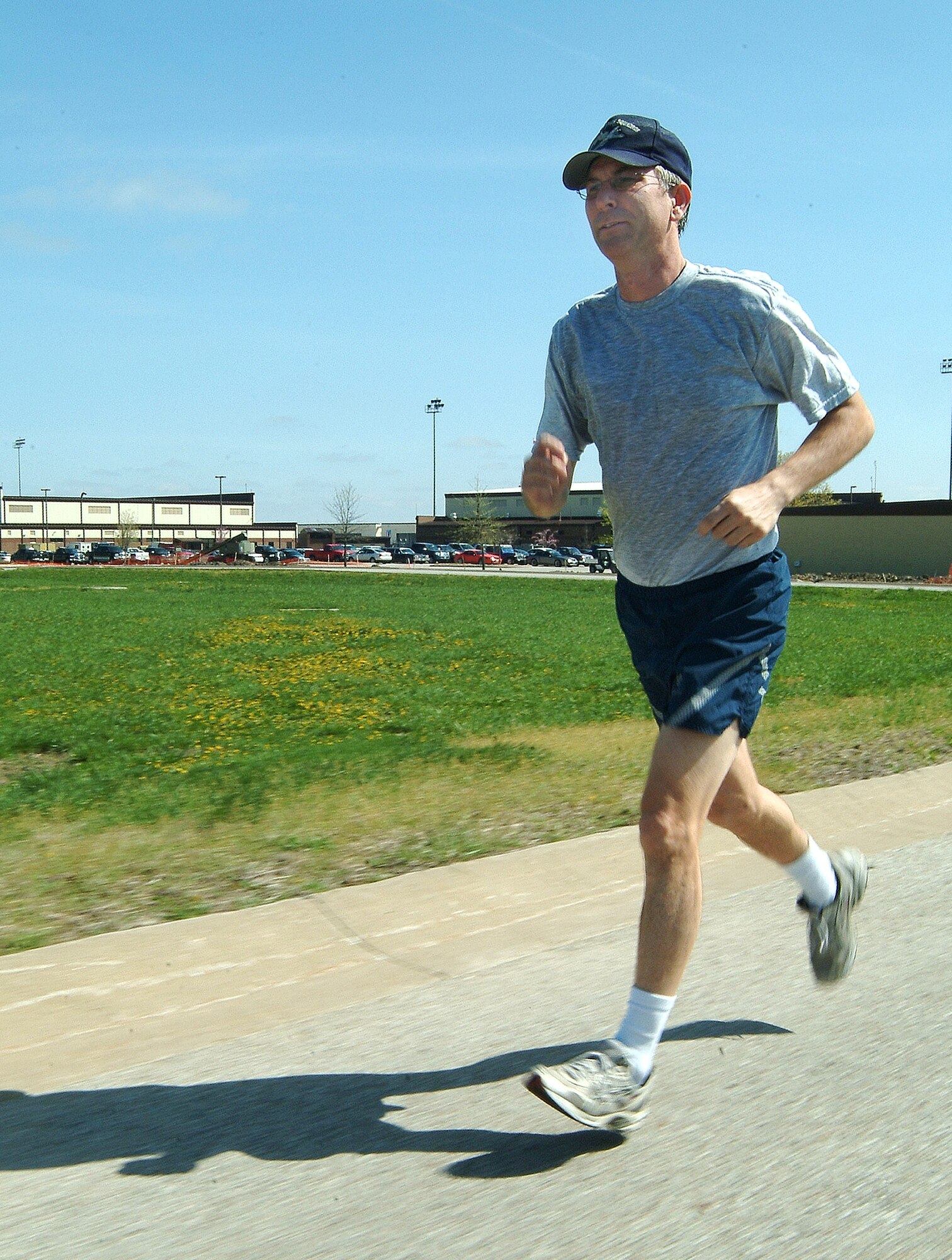 Senior Master Sgt. Mark Mock, a reservist from the 442nd Maintenance Squadron, jogs at Whiteman Air Force Base, Mo., to stay in shape.  He, along with 17 other Citizen Airmen from the 442nd Fighter Wing, has scored a perfect score on the Air Force fitness test.  (U.S. Air Force photo/Master Sgt. William Huntington)
