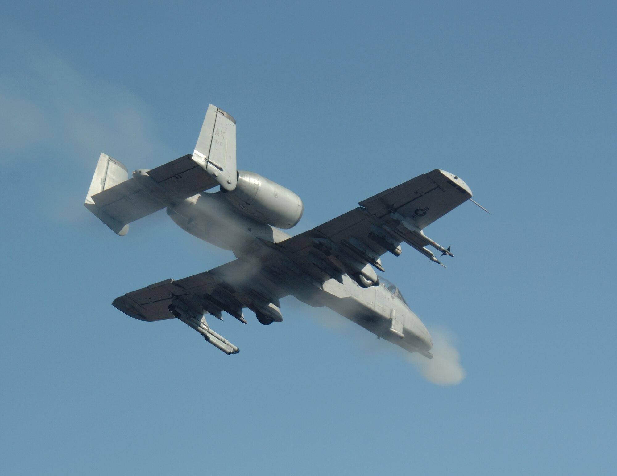 Capt. Dustin Ireland fires the GAU-8 from an A-10 Thunderbolt II April 24 over the Pacific Alaska Range Complex during live-fire training. Captain Ireland is an A-10 pilot from the 355th Fighter Squadron from Eielson Air Force Base, Alaska. Members from the 355th FS are tasked to provide mission ready A-10s and a search and rescue capability, in Alaska and deployed sites worldwide. (U.S. Air Force photo/Master Sgt. Robert Wieland)
