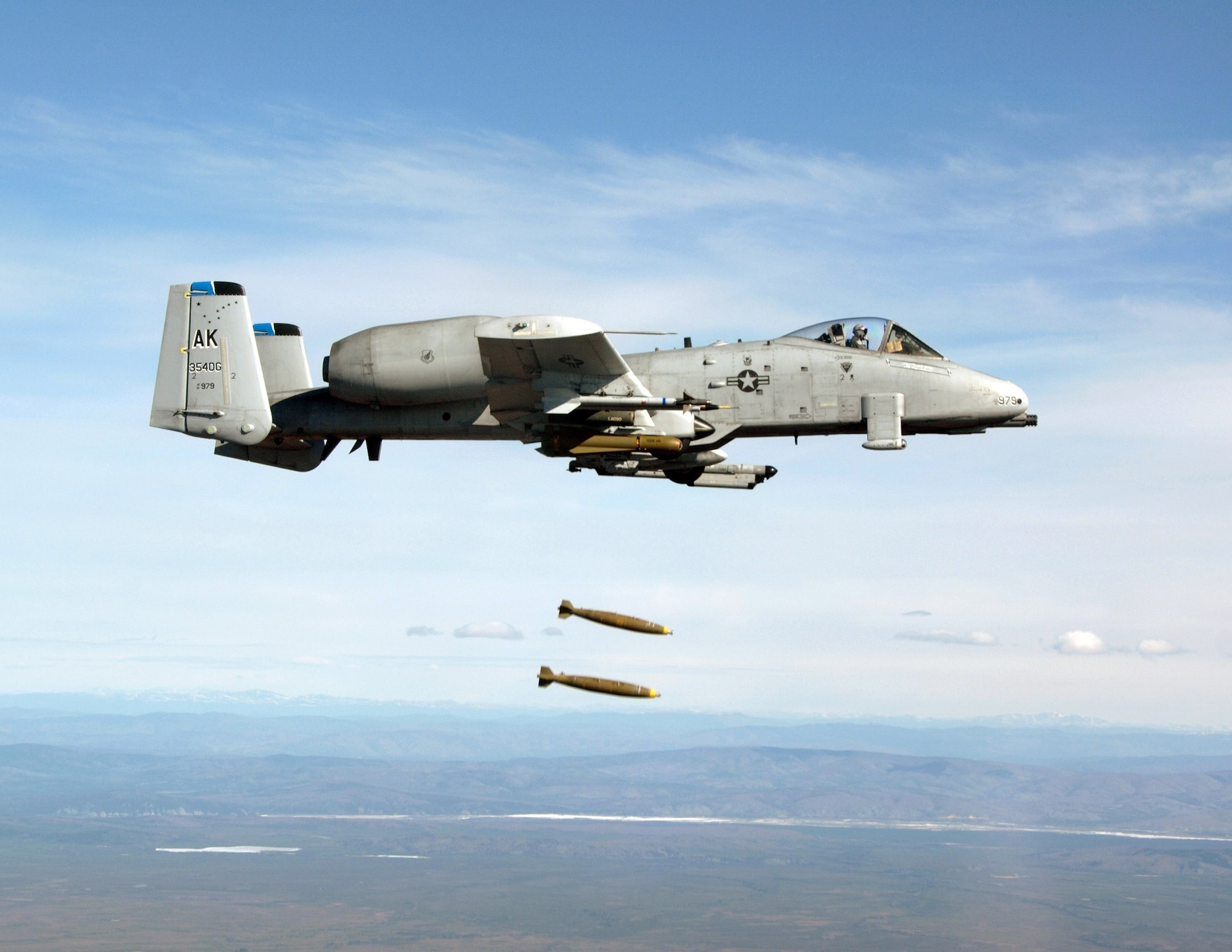 Capt. Will Reynolds drops Mk-82 bombs from an A-10 Thunderbolt II over the Pacific Alaska Range Complex April 24 during live-fire training. Captain Reynolds is an A-10 pilot from the 355th Fighter Squadron from Eielson Air Force Base, Alaska. Members from the 355th FS are tasked to provide mission ready A-10s and a search and rescue capability, in Alaska and deployed sites worldwide. (U.S. Air Force photo/Master Sgt. Robert Wieland) 
