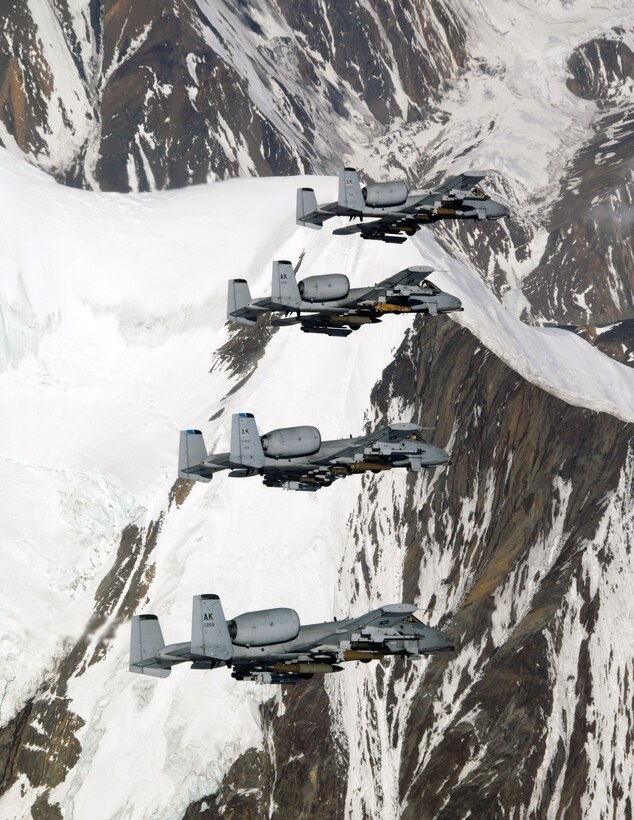 A-10 Thunderbolt IIs fly over the Pacific Alaska Range Complex April 24 during live-fire training. The A-10s are from the 355th Fighter Squadron from Eielson Air Force Base, Alaska. Members from the 355th FS are tasked to provide mission ready A-10s and a search and rescue capability, in Alaska and deployed sites worldwide. (U.S. Air Force photo/Master Sgt. Robert Wieland)