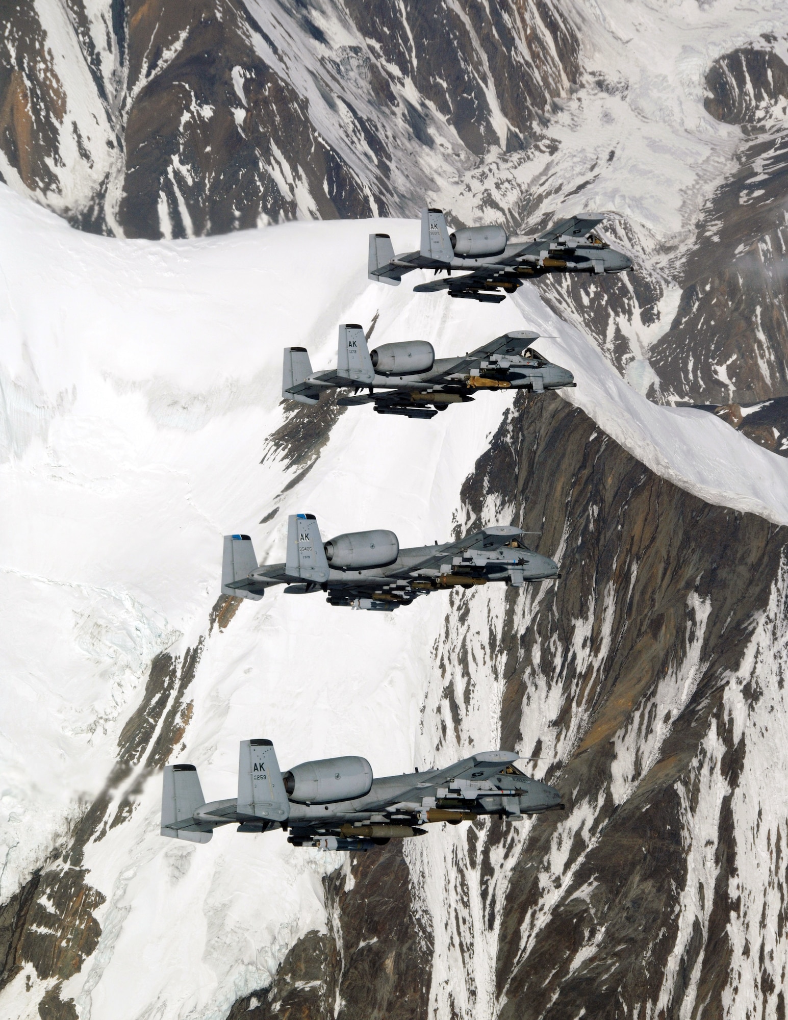 A-10 Thunderbolt IIs fly over the Pacific Alaska Range Complex April 24 during live-fire training. The A-10s are from the 355th Fighter Squadron from Eielson Air Force Base, Alaska. Members from the 355th FS are tasked to provide mission ready A-10s and a search and rescue capability, in Alaska and deployed sites worldwide. (U.S. Air Force photo/Master Sgt. Robert Wieland)
