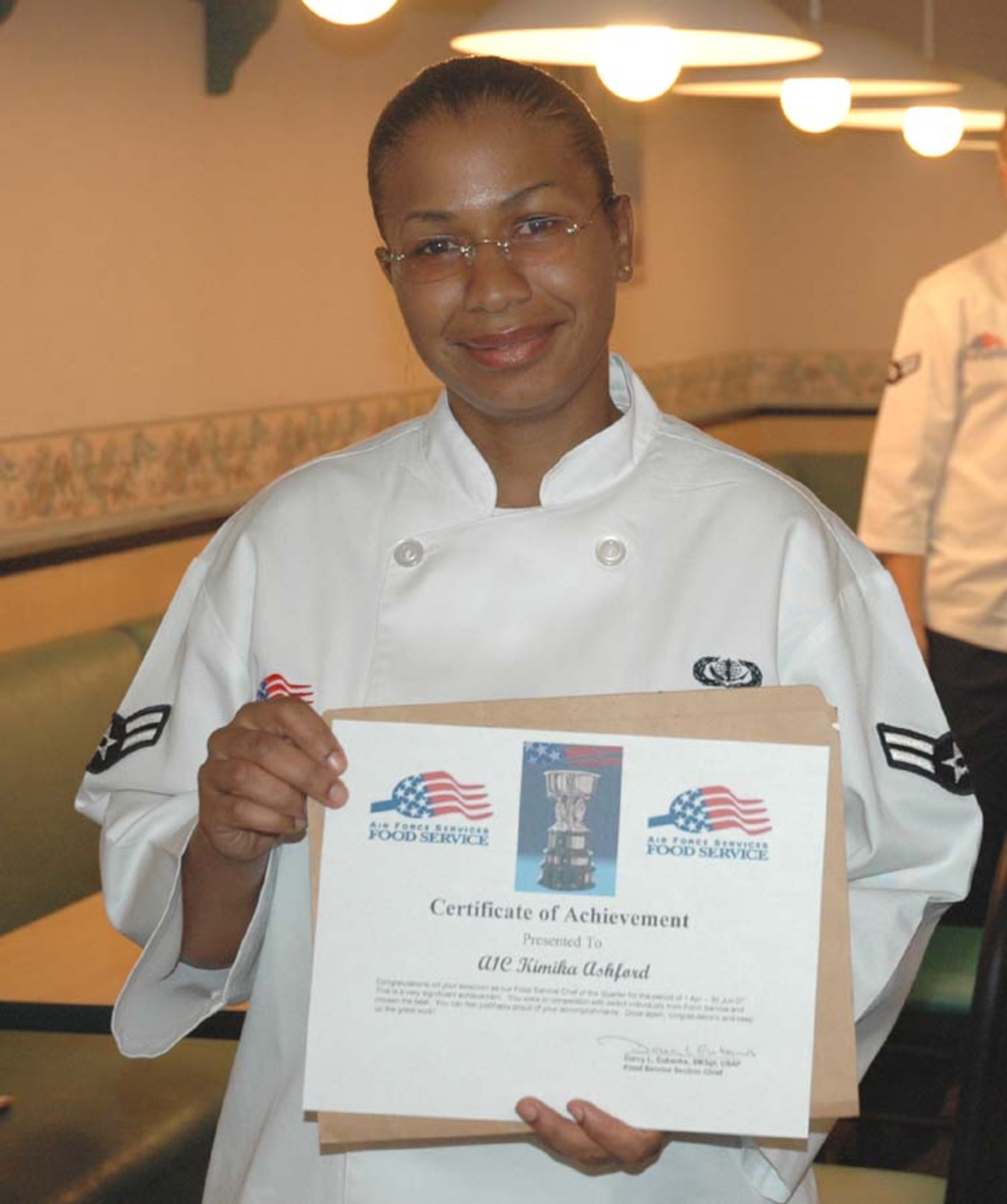 Three chefs competed April 20 for 2007's first 1st Special Operations Services Squadron Chef of the Quarter competition. Airmen 1st Class Katrina Spencer, Kimika Ashford and Fletcher Garner cooked for a panel of judges who sampled each dish and rated them individually. Airman Ashford was declared the winner. (U.S. Air Force photo by Staff Sgt. Sam House)