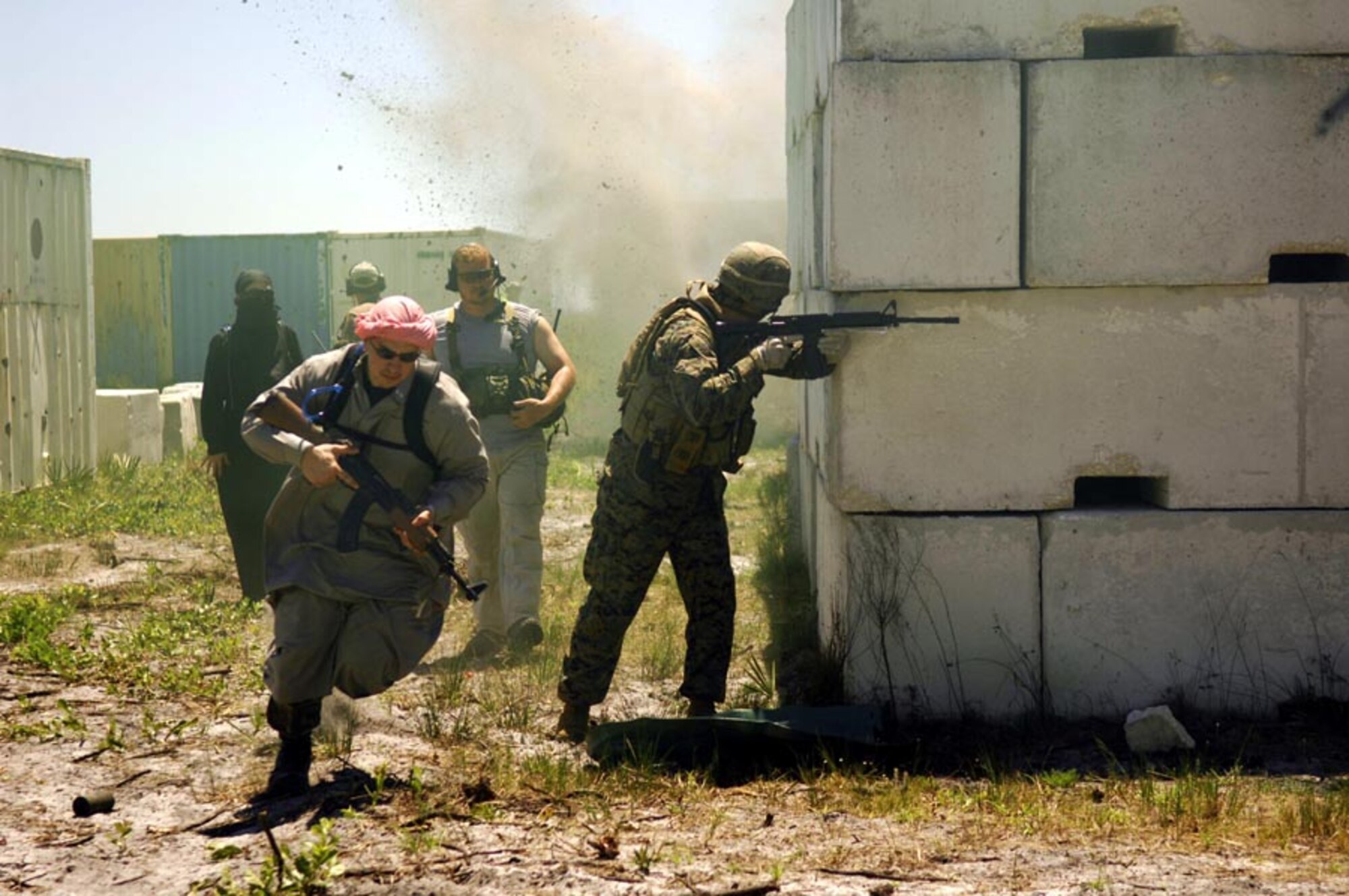 Army soldiers from Scout Platoon 3-67 AR, 4th ID, Ft. Hood, Texas, move quickly to clear buildings of opposition forces during Atlantic Strike V April 18, 2007. Atlantic Strike is a joint forces training event involving joint terminal attack controllers from the Army, Air Force and Marines  and is held semi-annually at Avon Park Air Ground training Complex, Avon Park, Fla. (U.S. Air Force photo by Staff Sgt. Stephen Otero)