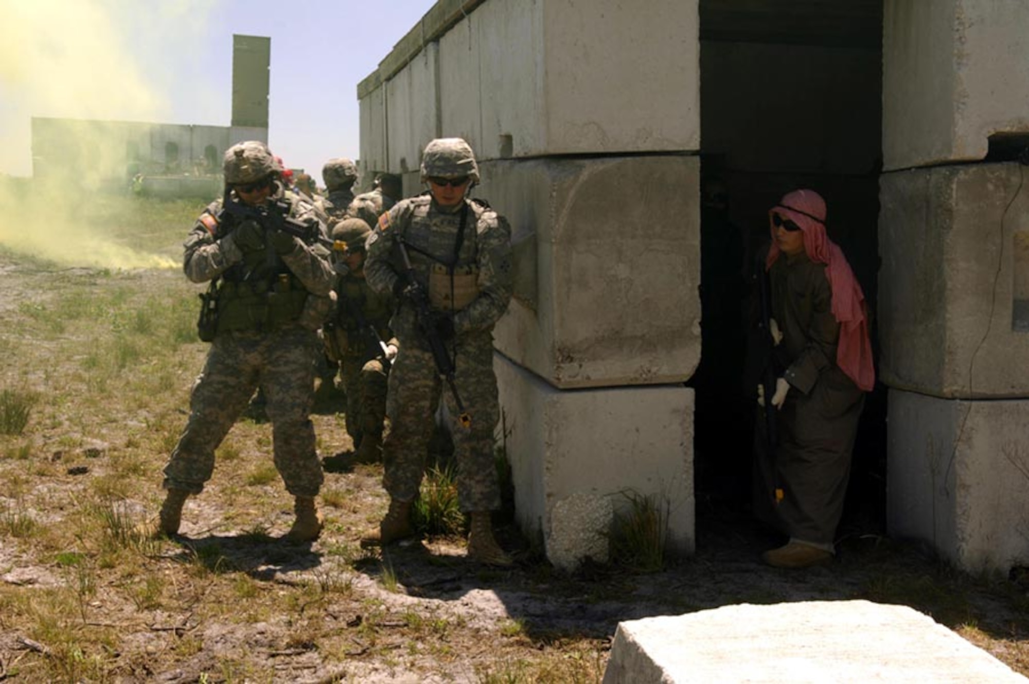 Members of the Scout Platoon 3-67 AR, 4th ID, Ft. Hood, Texas, prepare to engage opposition forces participating in Atlantic Strike V April 17. Atlantic Strike is a joint forces training event involving joint terminal attack controllers from the Army, Air Force and Marines  and is held semi-annually at Avon Park Air Ground training Complex, Avon Park, Fla. (U.S. Air Force photo by Staff Sgt. Stephen Otero)