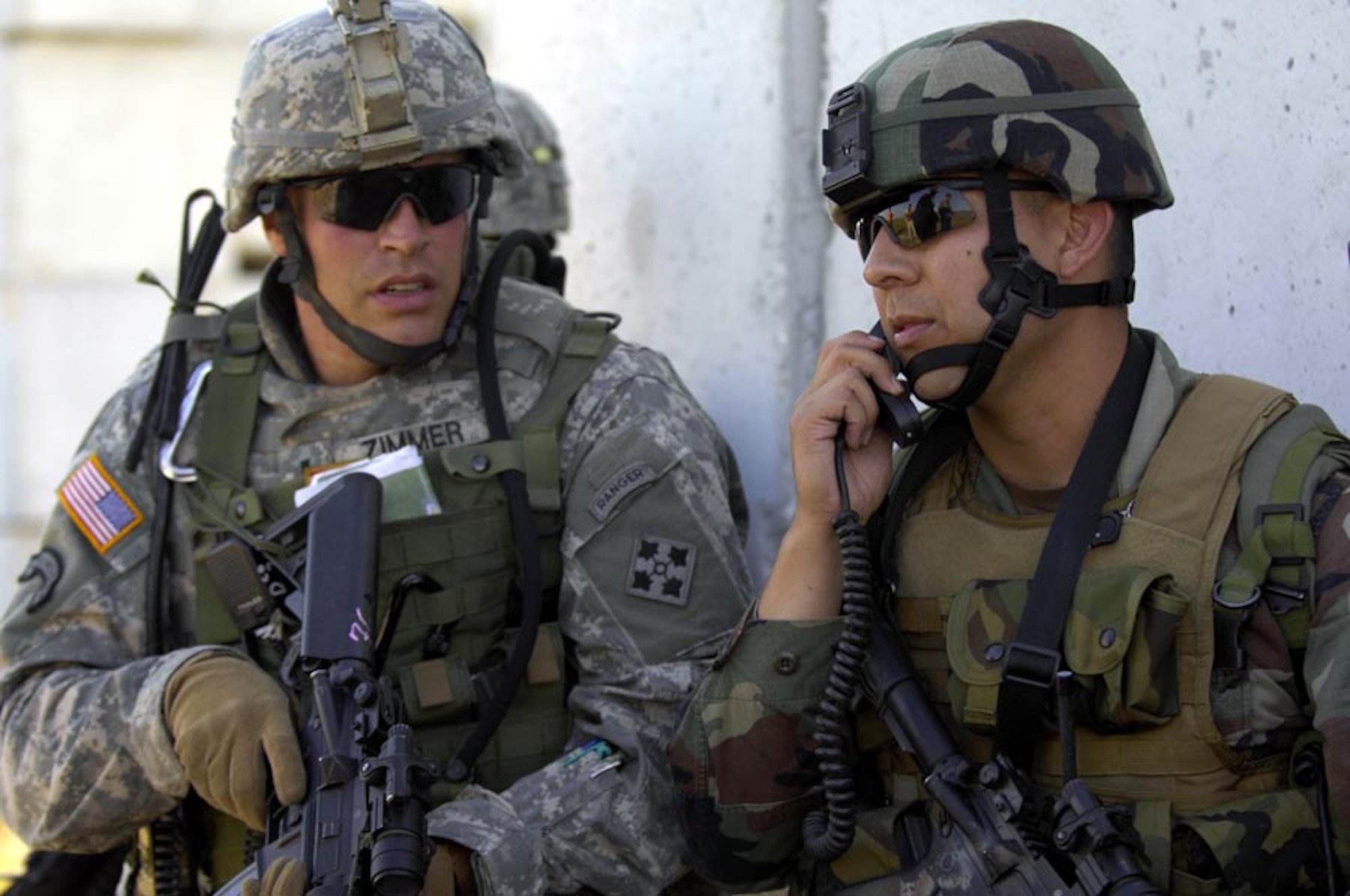 Staff Sgt. Mike Warner, joint tactical air controller from the 274th Air Support Operations Squadron, works alongside Army 1st Lt. Daniel Zimmer, 4th Infranty Division, during Atlantic Strike V April 16. (U.S. Air Force photo by Staff Sgt. Stephen Otero)