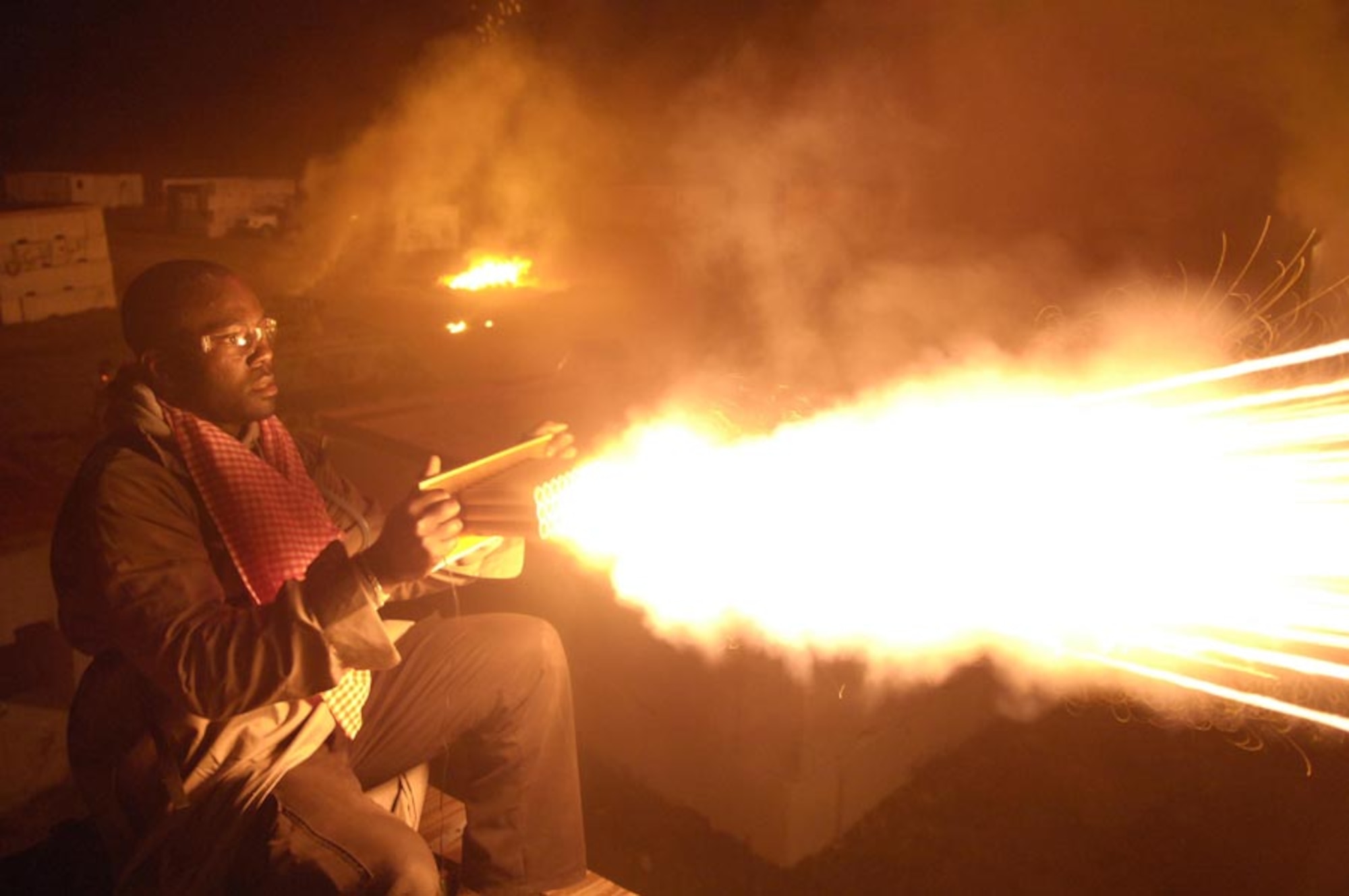 Master Sgt. Terry Kelly, superintendent of operations training for USCENTAF, launches simulated heavy machine gun fire at Soldiers and Airmen participating in Atlantic Strike V April 18, 2007. Atlantic Strike is a joint forces training event involving joint terminal attack controllers from the Army, Air Force and Marines  and is held semi-annually at Avon Park Air Ground training Complex, Avon Park, Fla.
 (U.S. Air Force photo by Staff Sgt. Stephen Otero)