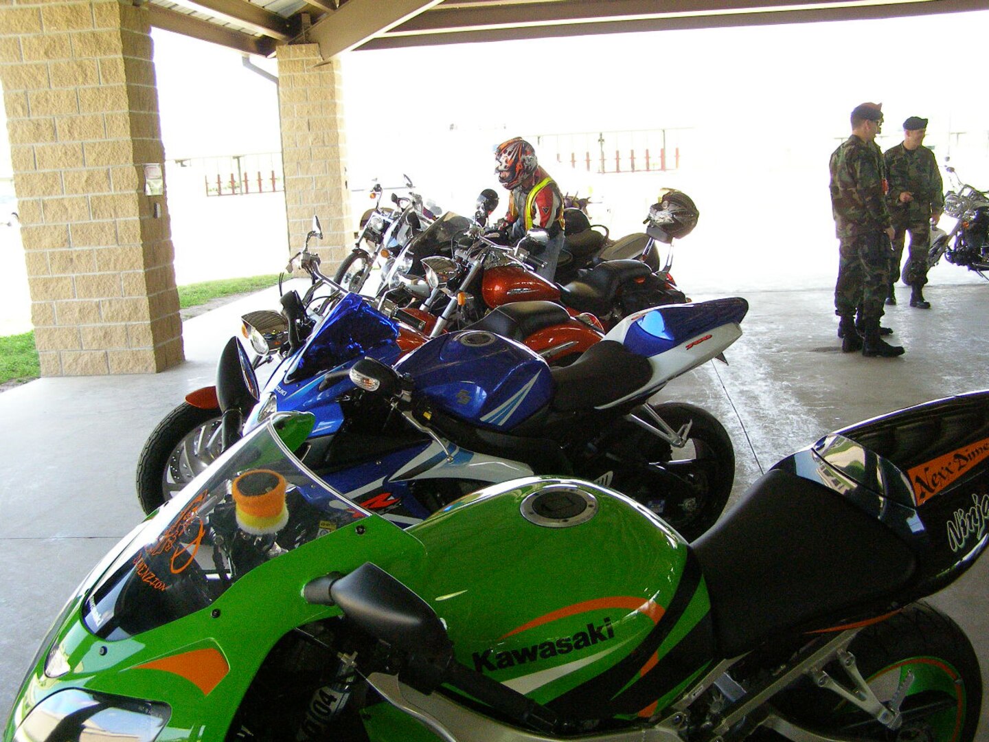 Brent Von Aschen mounts his bike during the 342nd Training Squadron's Motorcycle Safety and Bike Show April 20 at Lackland Air Force Base, Texas. The event was hosted by the combat weapons flight. Thirty-five bikes were on display at the Combat Arms Firing Range, Lackland Training Annex. The Motorcycle School instructors talked about motorcycle safety, including identifying the proper gear that should be worn, and how to get started in riding. The brief also included how to stay safe around other vehicles. (USAF photo by Tech. Sgt. Eric Kennedy)