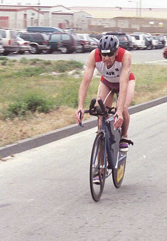 Air Force Lt. Col. Bob Fink of Bradley Air National Guard Base, Conn., held the lead coming off the 40-kilometer bike race, the second event of the third annual Armed Forces Triathlon at Camp Pendleton, Calif. He finished third overall with a time of 1:54:46.