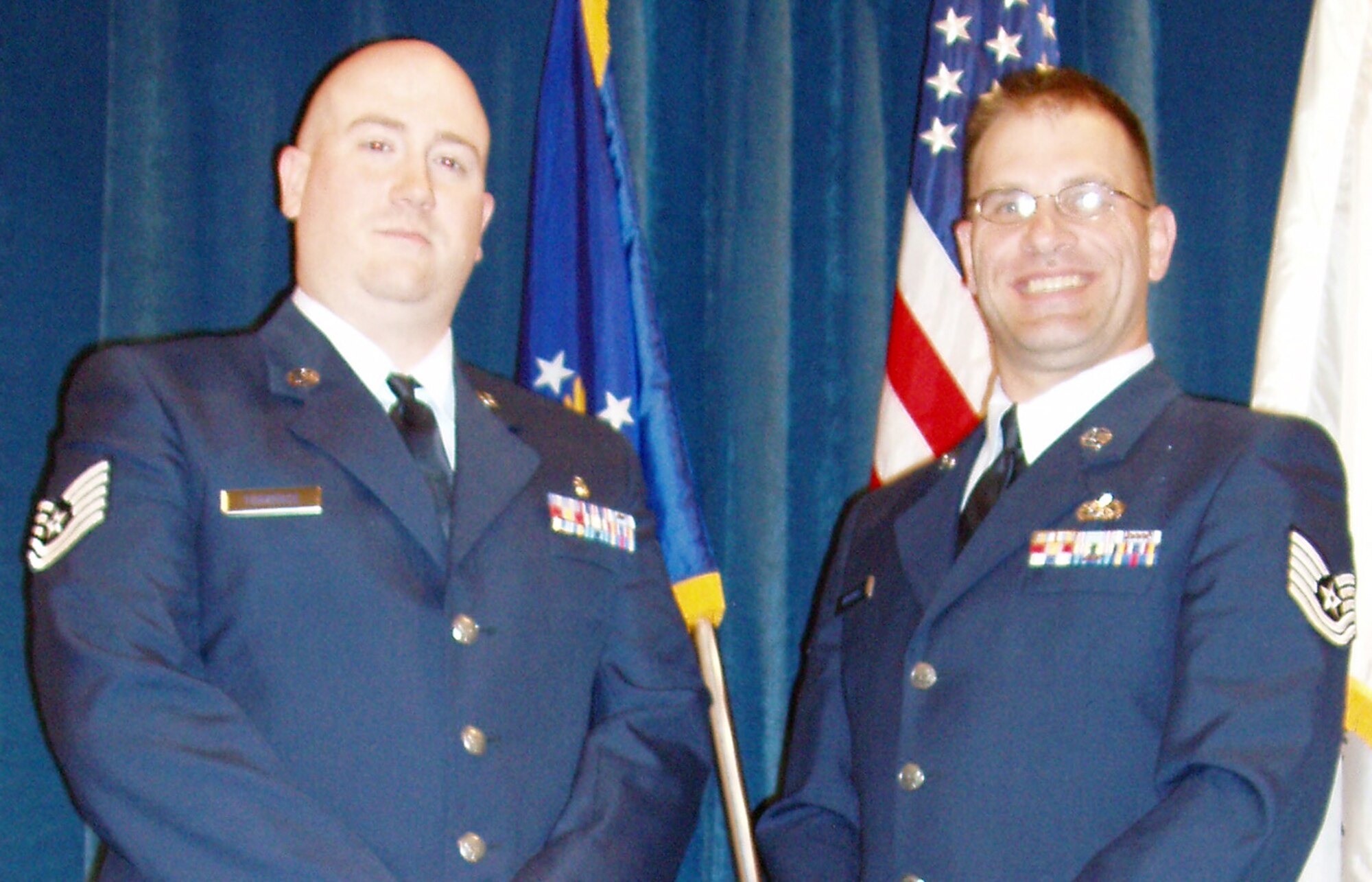 McGhee-Tyson Air National Guard Base, Knoxville, TN— Air Force Reserve Tech. Sgts. Tom Torrence (left), an aeromedical technician assigned to the 773rd Airlift Squadron and Michael Woodall (right), a C-130 propulsion technician with the 910th Aircraft Maintenance Squadron graduated from the Non-Commissioned Officer Academy (NCOA) here on April 11. Students must complete the NCOA before they assume the grade of master sergeant. The NCO Academy’s 223-hour curriculum consists of three academic areas — profession of arms, communication skills, and leadership. Students must complete the NCOA before they assume senior NCO status in the grade of master sergeant.


