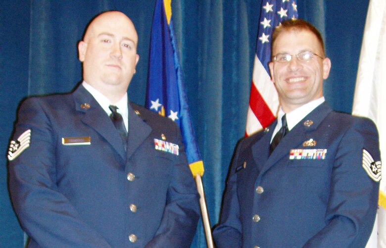 McGhee-Tyson Air National Guard Base, Knoxville, TN— Air Force Reserve Tech. Sgts. Tom Torrence (left), an aeromedical technician assigned to the 773rd Airlift Squadron and Michael Woodall (right), a C-130 propulsion technician with the 910th Aircraft Maintenance Squadron graduated from the Non-Commissioned Officer Academy (NCOA) here on April 11. Students must complete the NCOA before they assume the grade of master sergeant. The NCO Academy’s 223-hour curriculum consists of three academic areas — profession of arms, communication skills, and leadership. Students must complete the NCOA before they assume senior NCO status in the grade of master sergeant.


