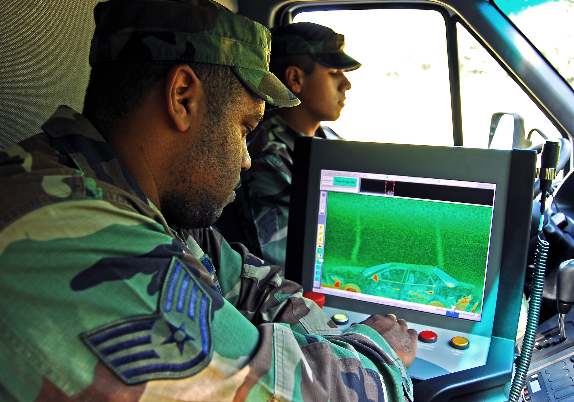 Staff Sgt. Jonathan Hobbs, 820th Security Forces Group sensor technician, uses a Z backscatter van to scan a suspect vehicle during a training exercise here April 23. Moody Air Force Base’s 820th SFG owns two of the $1.2 million vehicles, which interpret reflected X-rays to create highly detailed images of low-density materials such as explosives or drugs. (U.S. Air Force photo by Tech. Sgt. Parker Gyokeres)