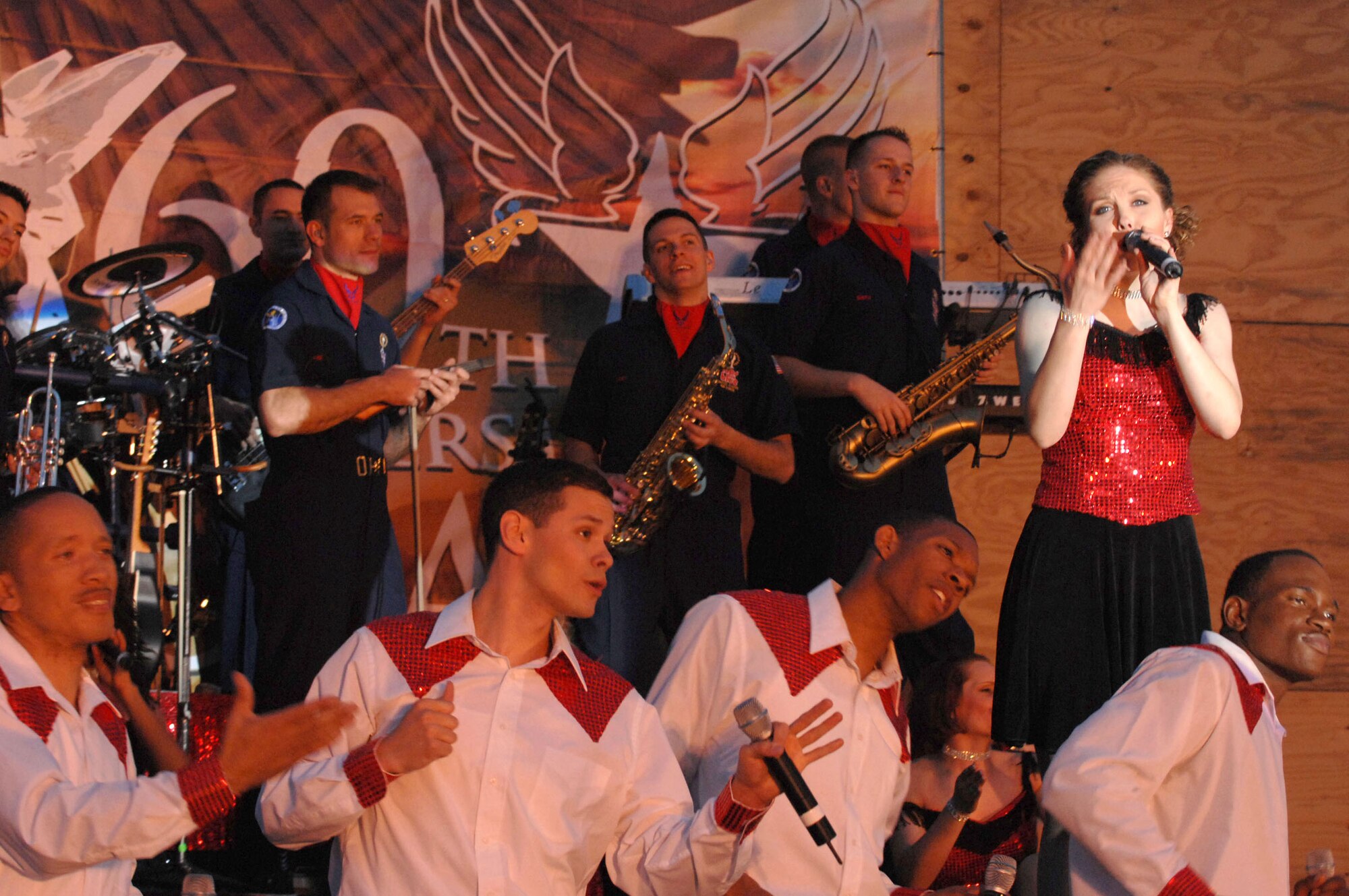 Tops in Blue members perform for Airmen and Soldiers April 26 at Kirkuk Air Base, Iraq. Tops in Blue's goal is to enhance mission productivity for Air Force members around the world. Tops In Blue Airmen perform an average of 120 performances at 100 locations worldwide each year. (U.S. Air Force photo/Senior Airman Bradley A. Lail) 
