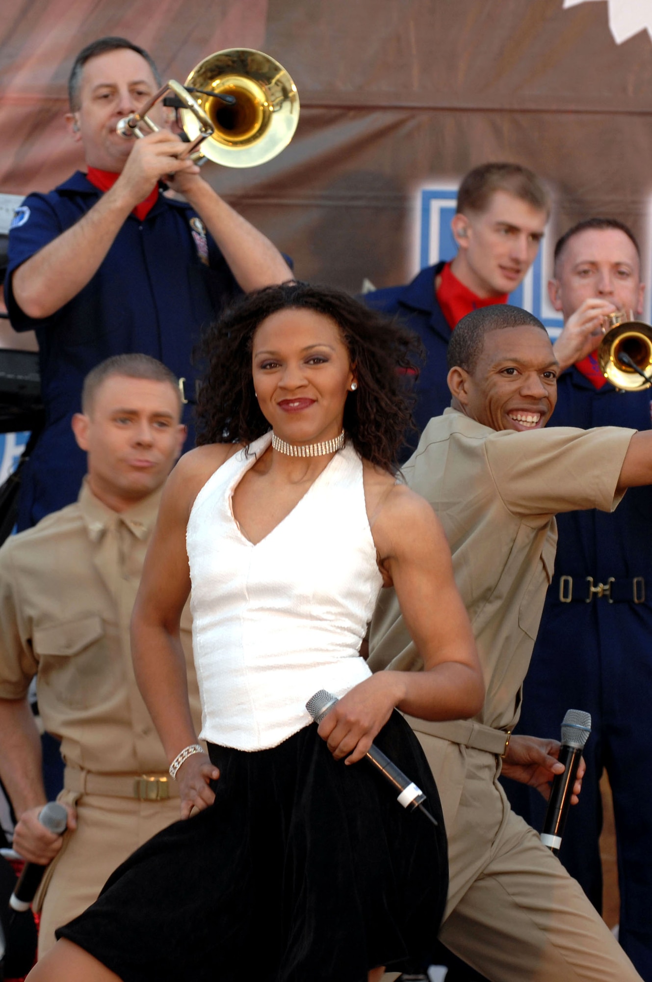 Tops in Blue members perform for Airmen and Soldiers April 26 at Kirkuk Air Base, Iraq. Tops in Blue's goal is to enhance mission productivity for Air Force members around the world. Tops In Blue Airmen perform an average of 120 performances at 100 locations worldwide each year. (U.S. Air Force photo/Senior Airman Bradley A. Lail) 
