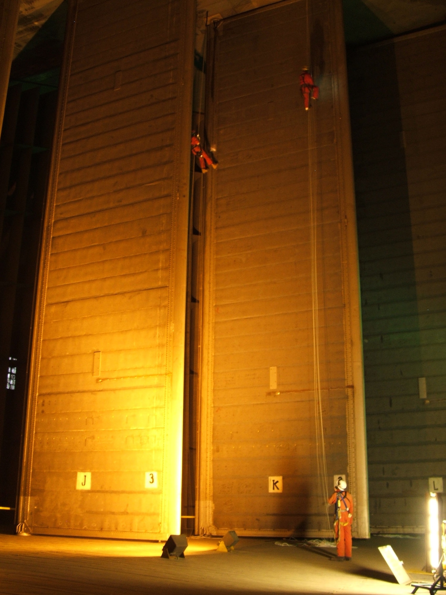 Remote Access Technology (RAT) team performs an elevated inspection and maintenance of a vane door on vane set three at the National Full-Scale Aerodynamic Complex facility at Moffett Field, Calif.