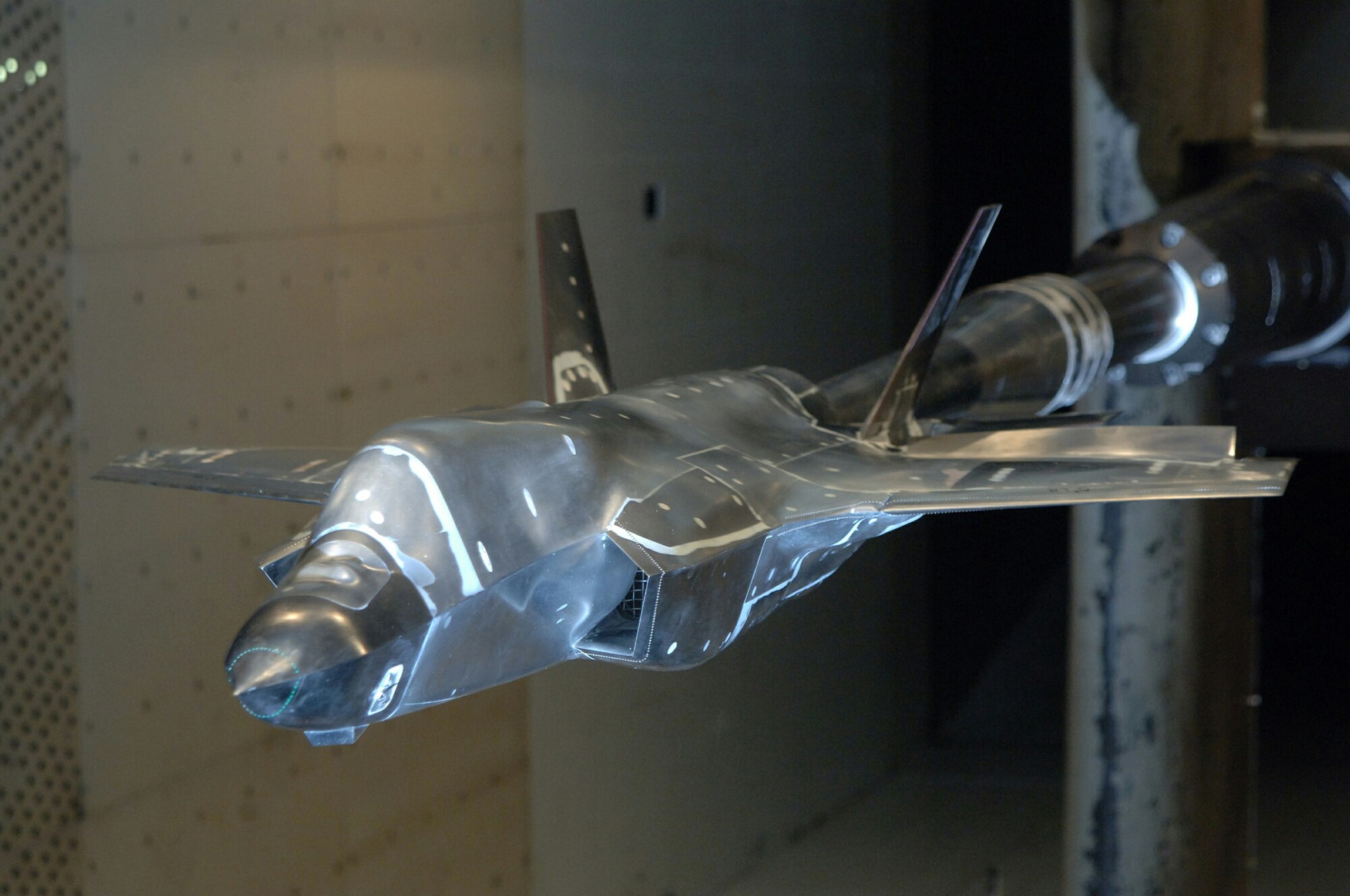 A 12-percent model of the Short Takeoff/Vertical Landing (STOVL) version of the F-35 Lightning II is undergoing aerodynamic loads testing in AEDC’s 16-foot transonic wind tunnel. The information from this testing, the final entry in a series of tests, will go into a large database to refine and validate the aircraft designs for flight testing and ultimately, production of the CTOL and STOVL variants.