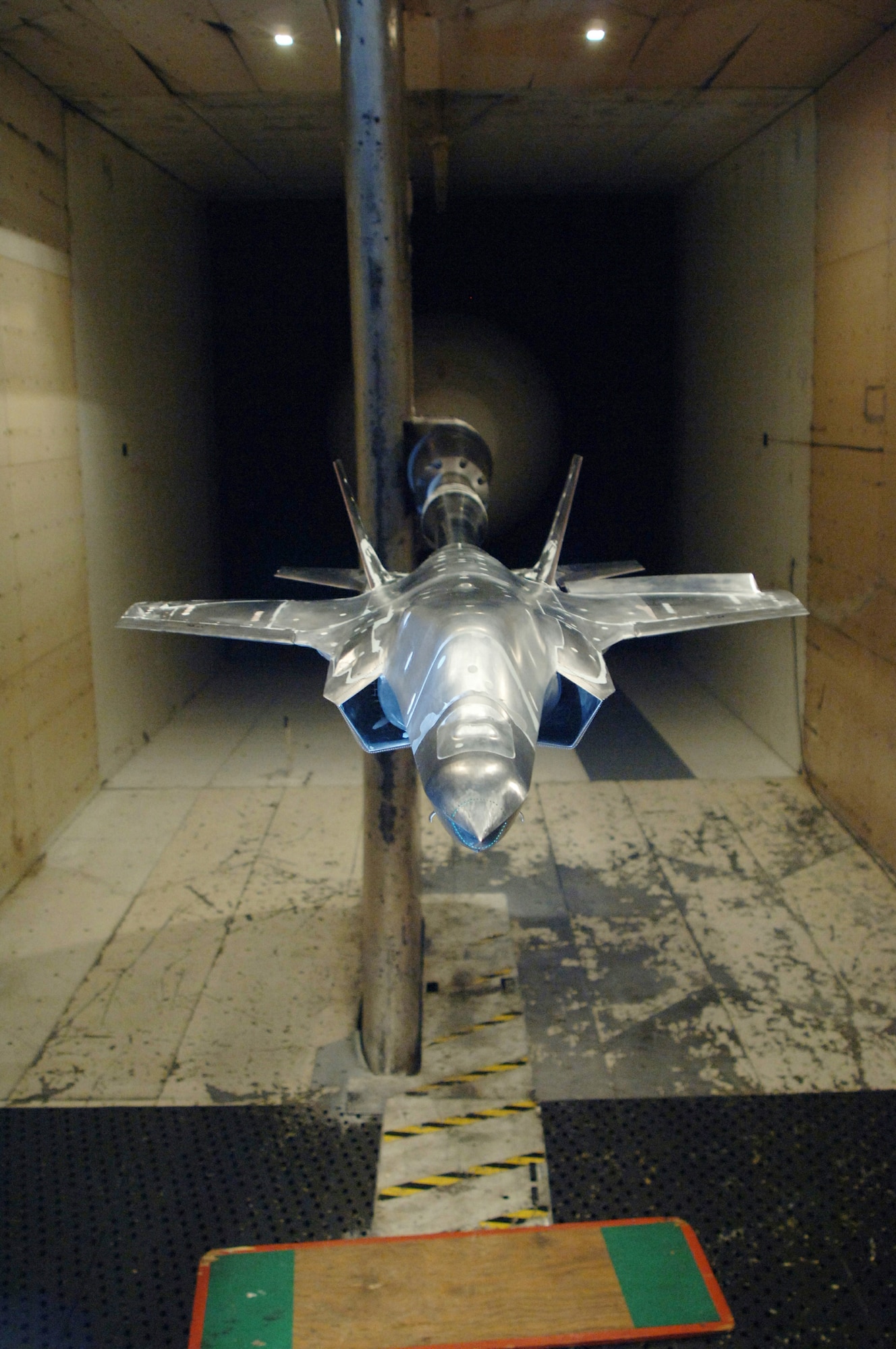 A 12-percent model of the Short Takeoff/Vertical Landing (STOVL) version of the F-35 Lightning II is undergoing aerodynamic loads testing in AEDC’s 16-foot transonic wind tunnel. The information from this testing, the final entry in a series of tests, will go into a large database to refine and validate the aircraft designs for flight testing and ultimately, production of the CTOL and STOVL variants.