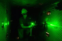 Nickolas Galyen, an engineer in Aerospace Testing Alliance’s Integrated Test and Evaluation department, aligns a calibration target during a series of tests to validate the use of stereo particle image velocimetry (PIV) in the 4-foot transonic wind tunnel at Arnold Engineering Development Center. Images of the precisely machined target are used to spatially calibrate particle images to measure three-dimensional velocity airflow fields.