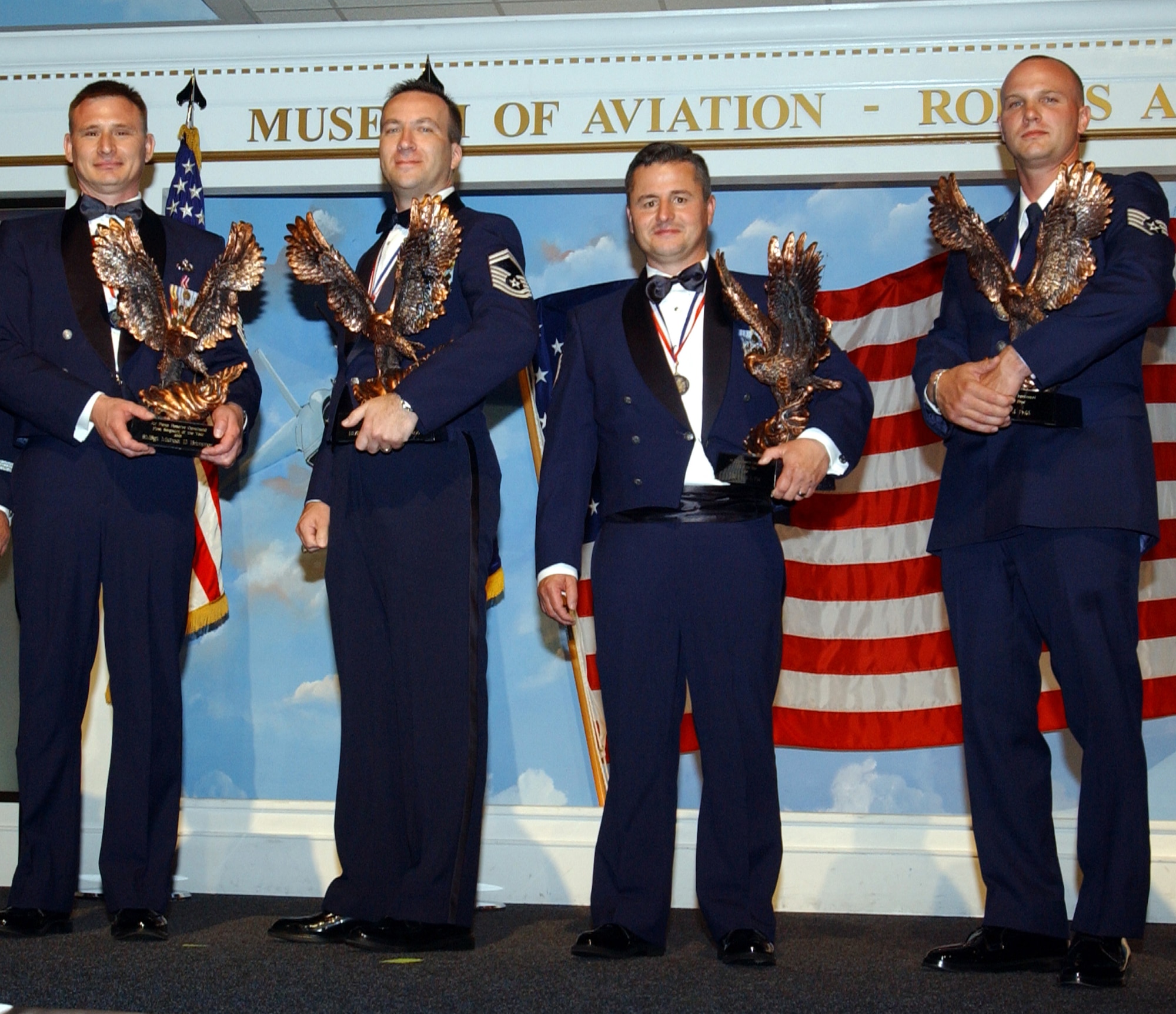 Air Force Reserve Command announces the 2006 Outstanding Airman/First Sergeant of the Year during a banquet held at the Museum of Aviation, Robins Air Force Base, Ga., April 26, 2007.  The winners are from left to right: First Sergeant category:Senior Master Sgt. Michael Brimmer; Senior NCO category: Senior Master Sgt. Ronald Colamininno; NCO category: Tech. Sgt. Frank Fox; and Airman category: Staff Sgt. Clinton Petit.  The winners will move forward to compete at the Air Force level. (U.S. Air Force photo/Senior Master Sgt. Elaine Mayo)