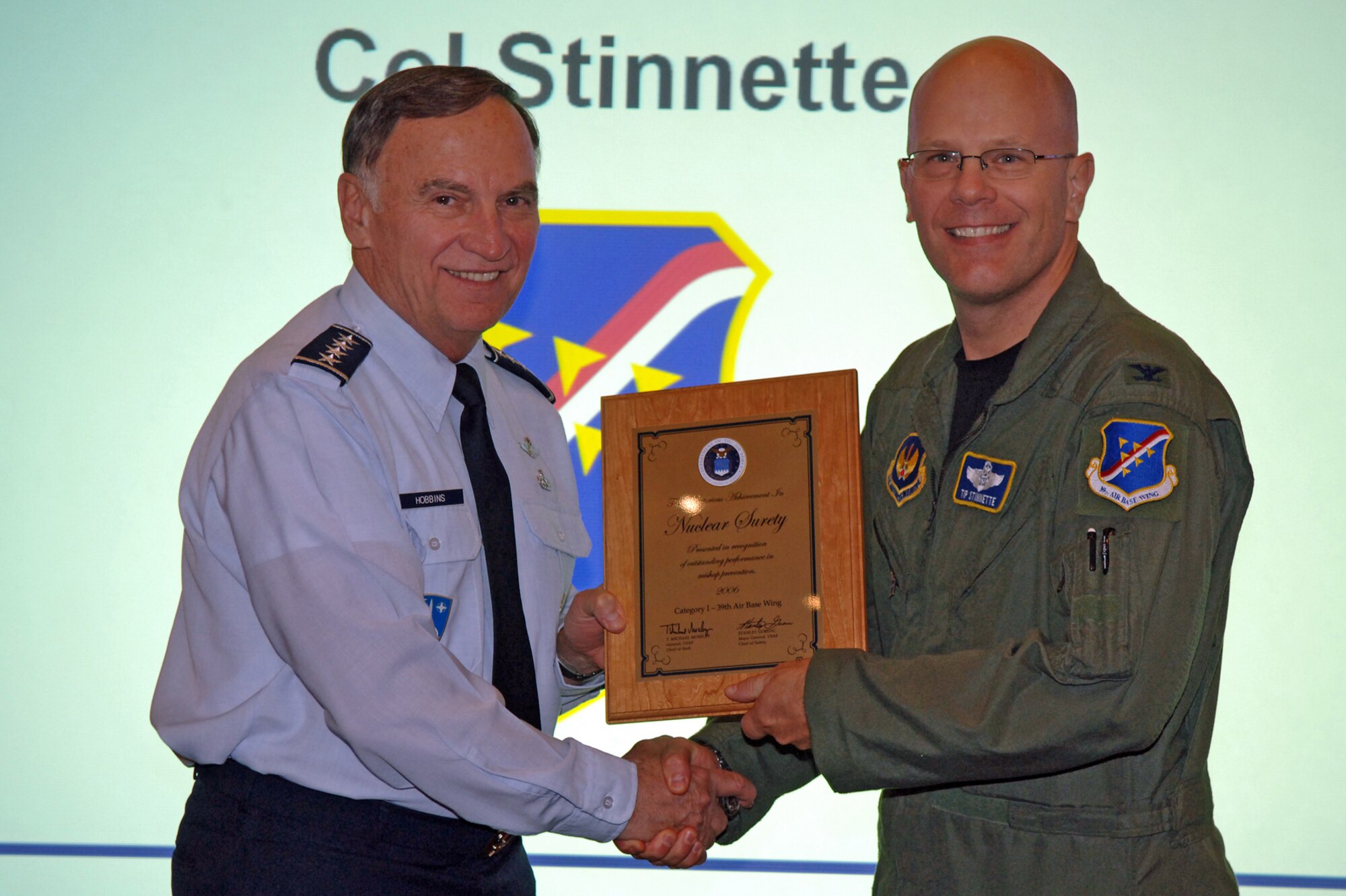 Gen. William Hobbins, United States Air Forces in Europe commander, presents Col. "Tip" Stinnette, 39th Air Base Wing commmander, with the Air Force Surety award.  The 39th Air Base Wing recently won two Air Force-level awards. The two annual awards, the Air Force Surety Plaque and the Air Force Explosives Safety Plaque, are some of the highest awards a base can win for safety achievements.  (U. S. Air Force photo by Airman 1st Class Marc Lane)