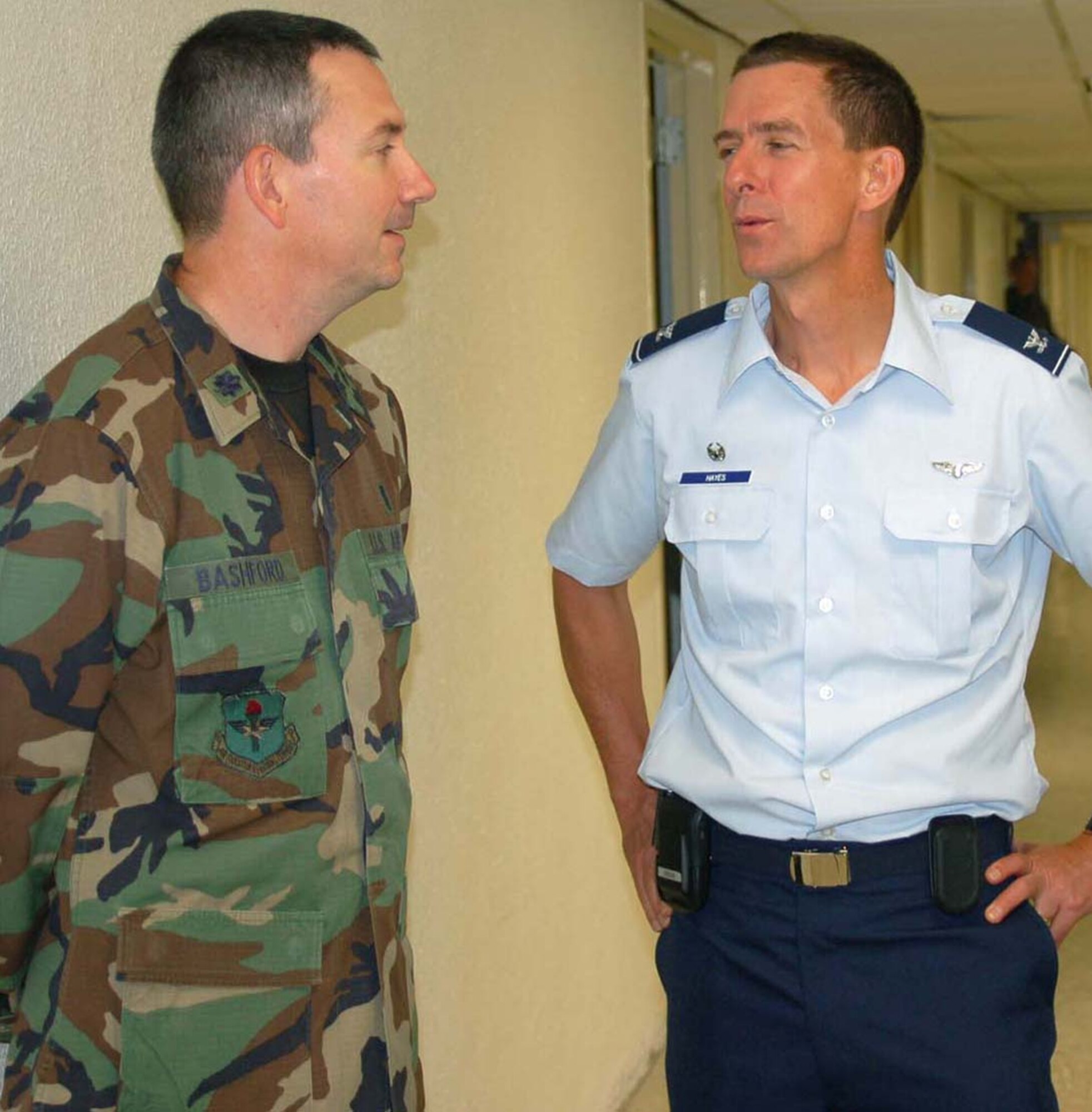 Lt. Col. (Dr.) Michael Bashford, left, obstetrics and gynecological flight commander, gets acquainted with Col. (Dr.) Bartlett Hayes, new 81st Surgical Oper-ations Squadron commander.  Colonel Hayes comes to Keesler from Landstuhl Regional Medical Center, Germany, where he was an ophthalmologist and chief of the surgery division.  (U.S Air Force photo by Steve Pivnick)