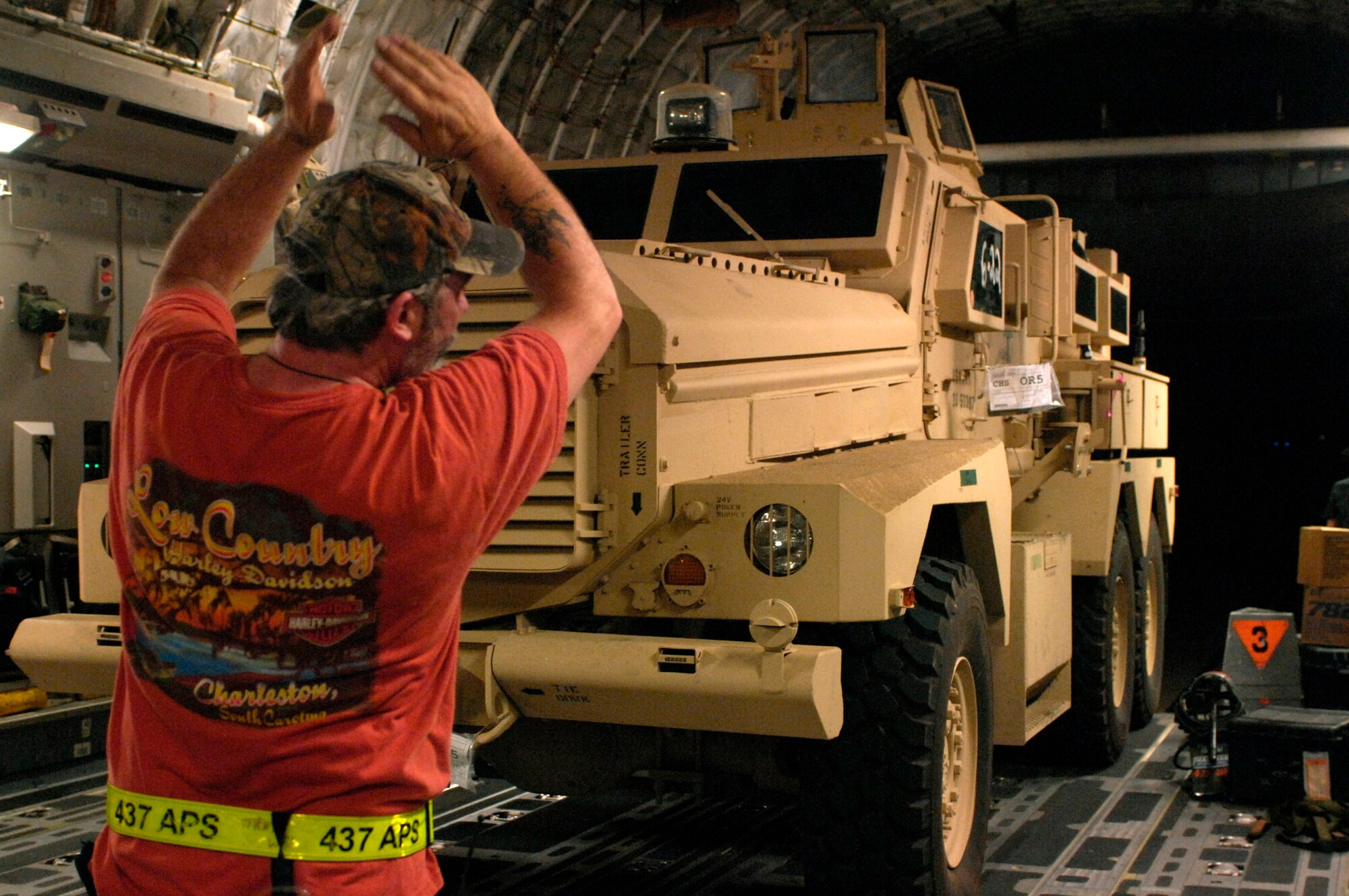 Bill Leeson of the 437th Aerial Port Squadron at Charleston Air Force Base, S.C., loads a Mine Resistant Ambush Protected armored vehicle on a C-17 Globemaster III for shipment to Iraq July 28. An estimated 3,500 MRAP vehicles are expected to be in Iraq by Dec. 31. (U.S. Air Force photo/Tech. Sgt. Jeromy K. Cross) 

