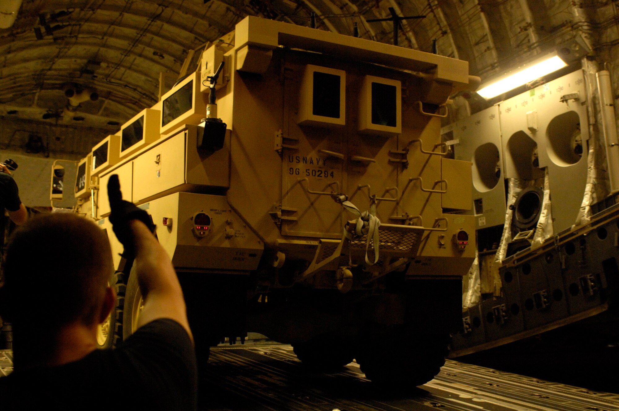 Airmen from the 437th Aerial Port Squadron at Charleston AFB, S.C., load a Mine Resistant Ambush Protected armored vehicle on a C-17 Globemaster III for shipment to Iraq July 28. An estimated 3,500 MRAP vehicles are expected to be in Iraq by Dec. 31. (U.S. Air Force photo/Tech. Sgt. Jeromy K. Cross)
