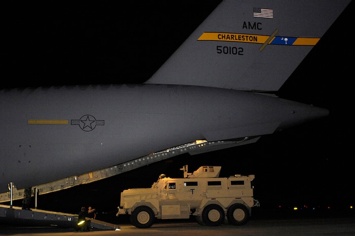 Airmen from the 437th Aerial Port Squadron at Charleston AFB, S.C., load a Mine Resistant Ambush Protected armored vehicle on a C-17 Globemaster III for shipment to Iraq July 28. An estimated 3,500 MRAP vehicles are expected to be in Iraq by Dec. 31. (U.S. Air Force photo/Tech. Sgt. Jeromy K. Cross)

